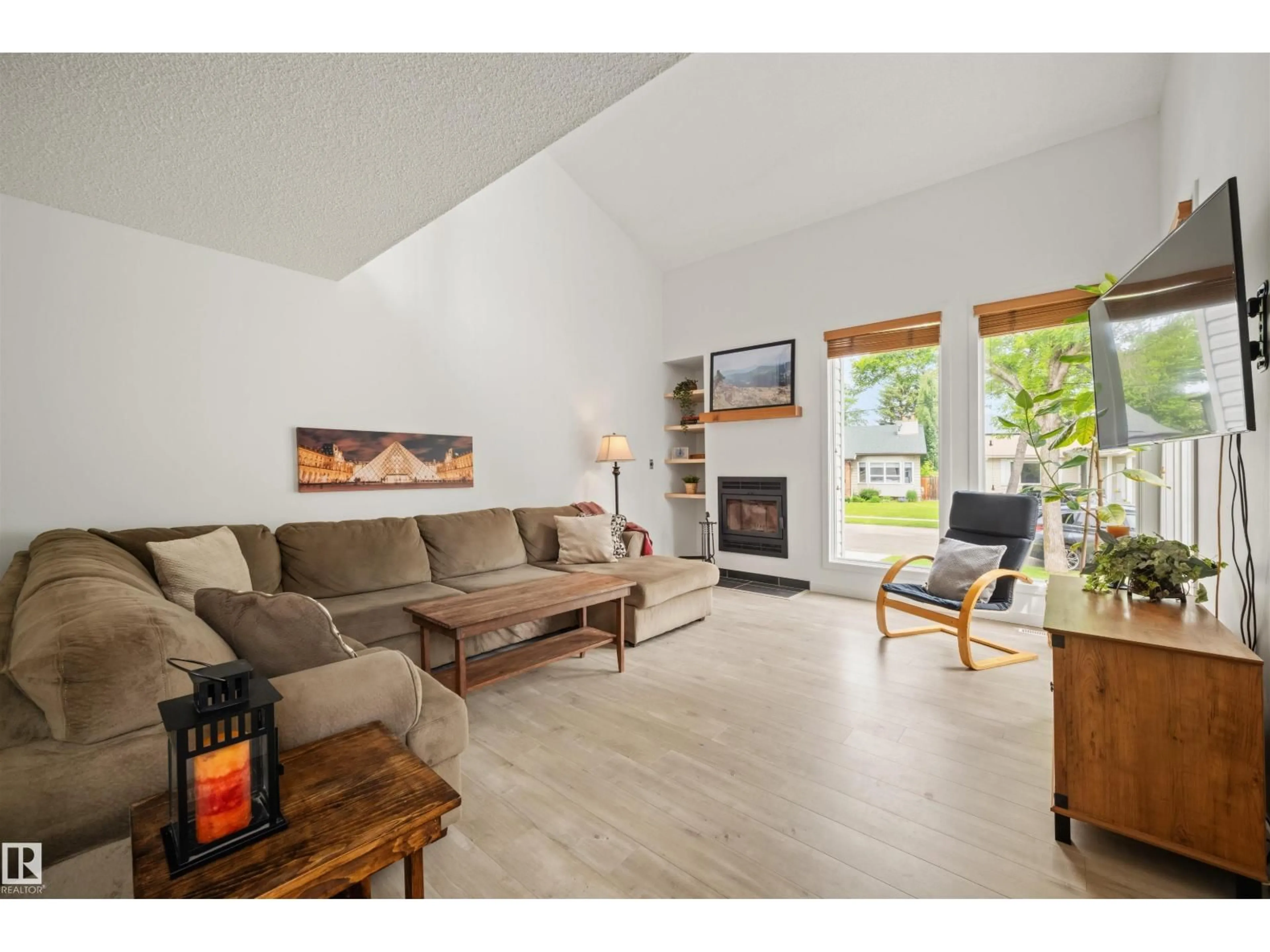 Living room with furniture, wood/laminate floor for 50 PRINCETON CR, St. Albert Alberta T8N4T3