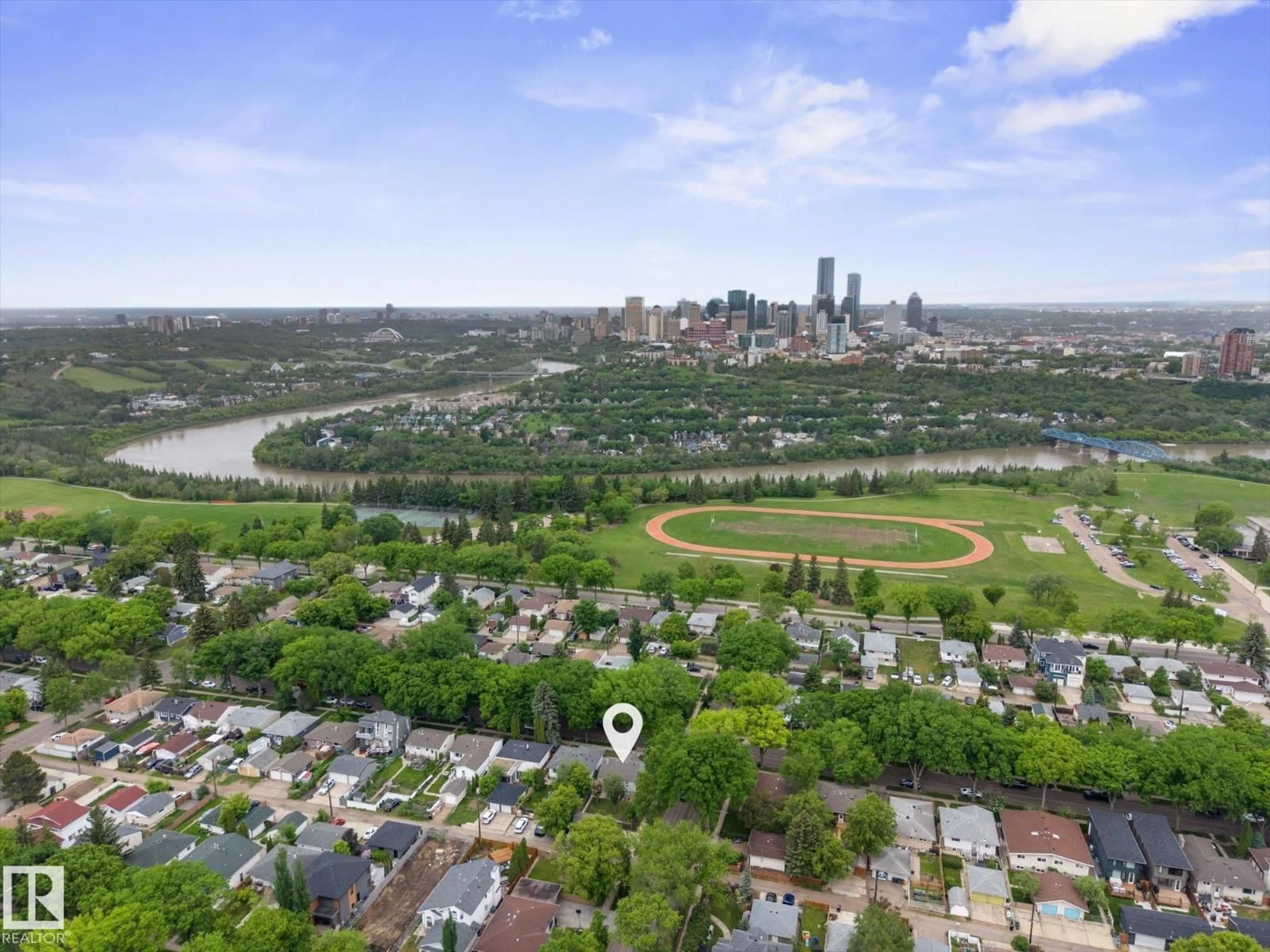 A pic from outside/outdoor area/front of a property/back of a property/a pic from drone, water/lake/river/ocean view for 10347 83 ST, Edmonton Alberta T6A3N9