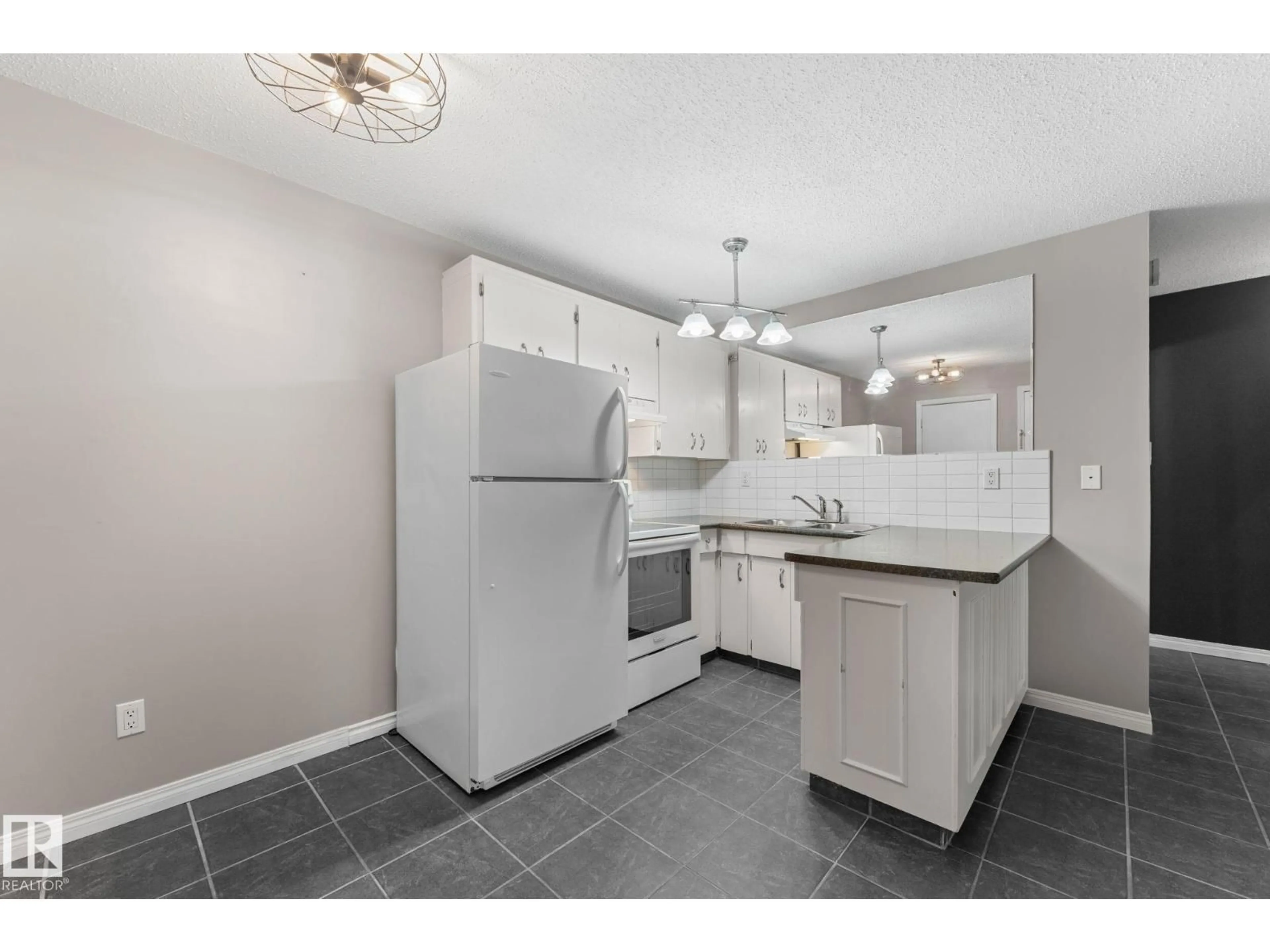 Standard kitchen, ceramic/tile floor for 102 - 10225 114 ST NW, Edmonton Alberta T5K1S1