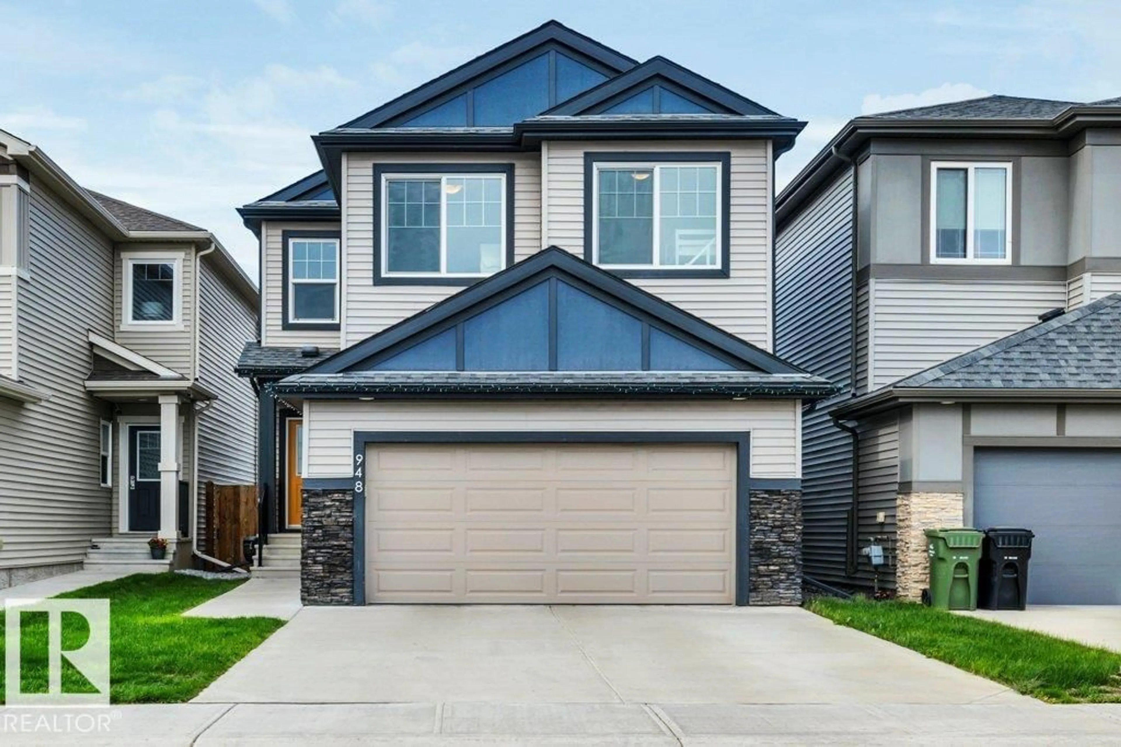 Home with vinyl exterior material, street for 948 BERG PL, Leduc Alberta T9E1J6