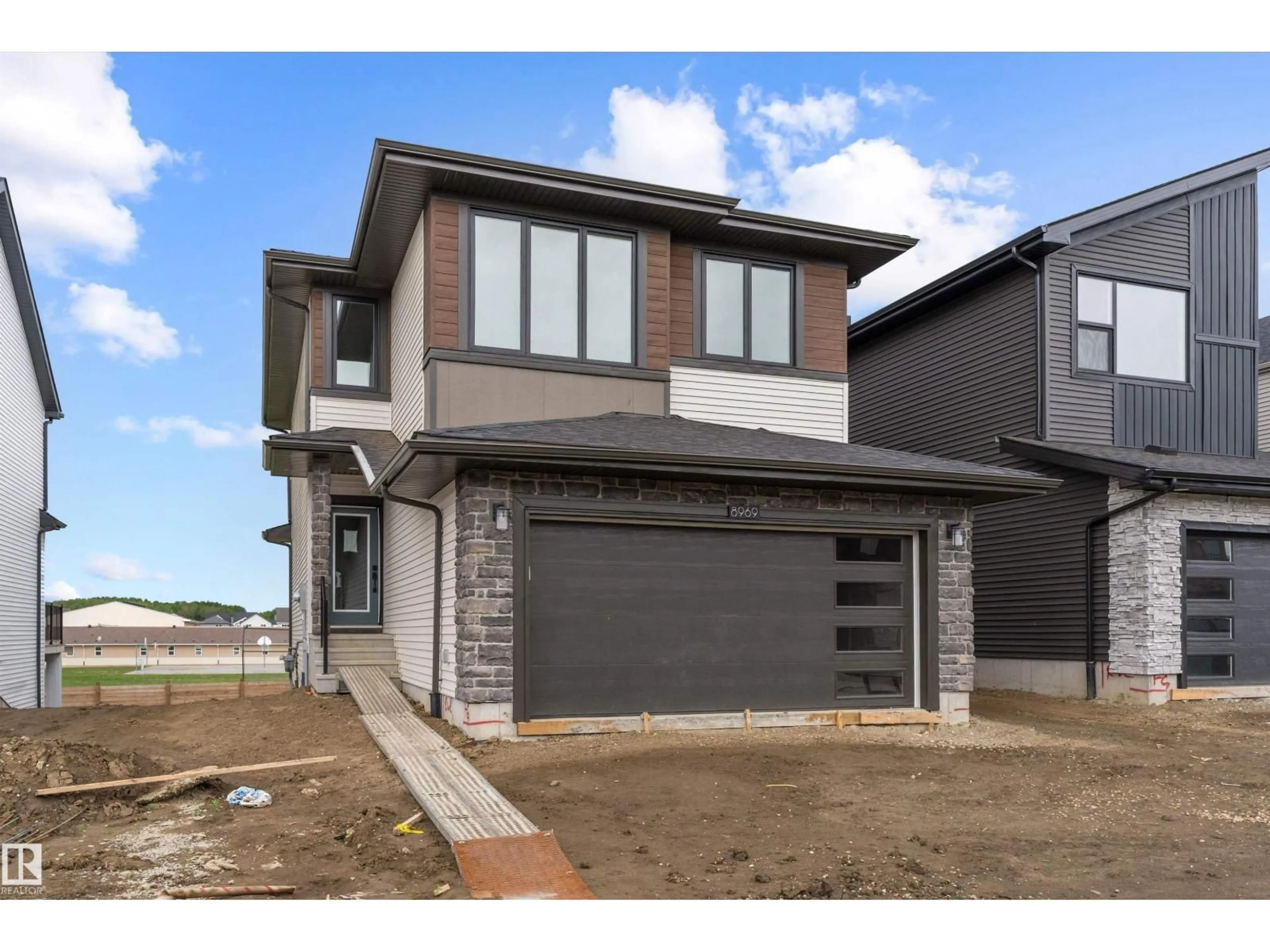 Home with brick exterior material, street for 8969 ELVES LO, Edmonton Alberta T6M3G3