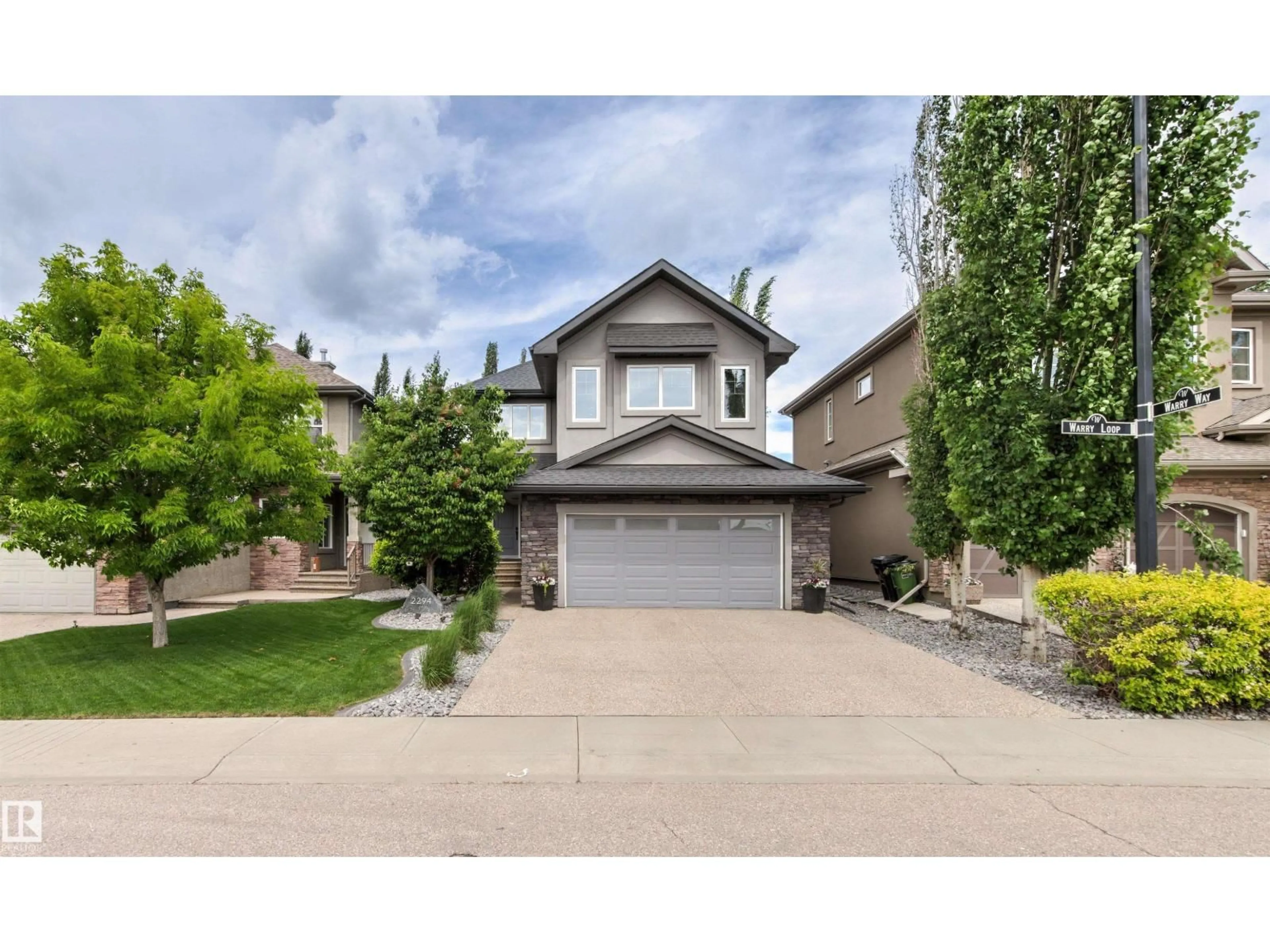 Home with vinyl exterior material, street for 2294 WARRY LO SW, Edmonton Alberta T6W0N8