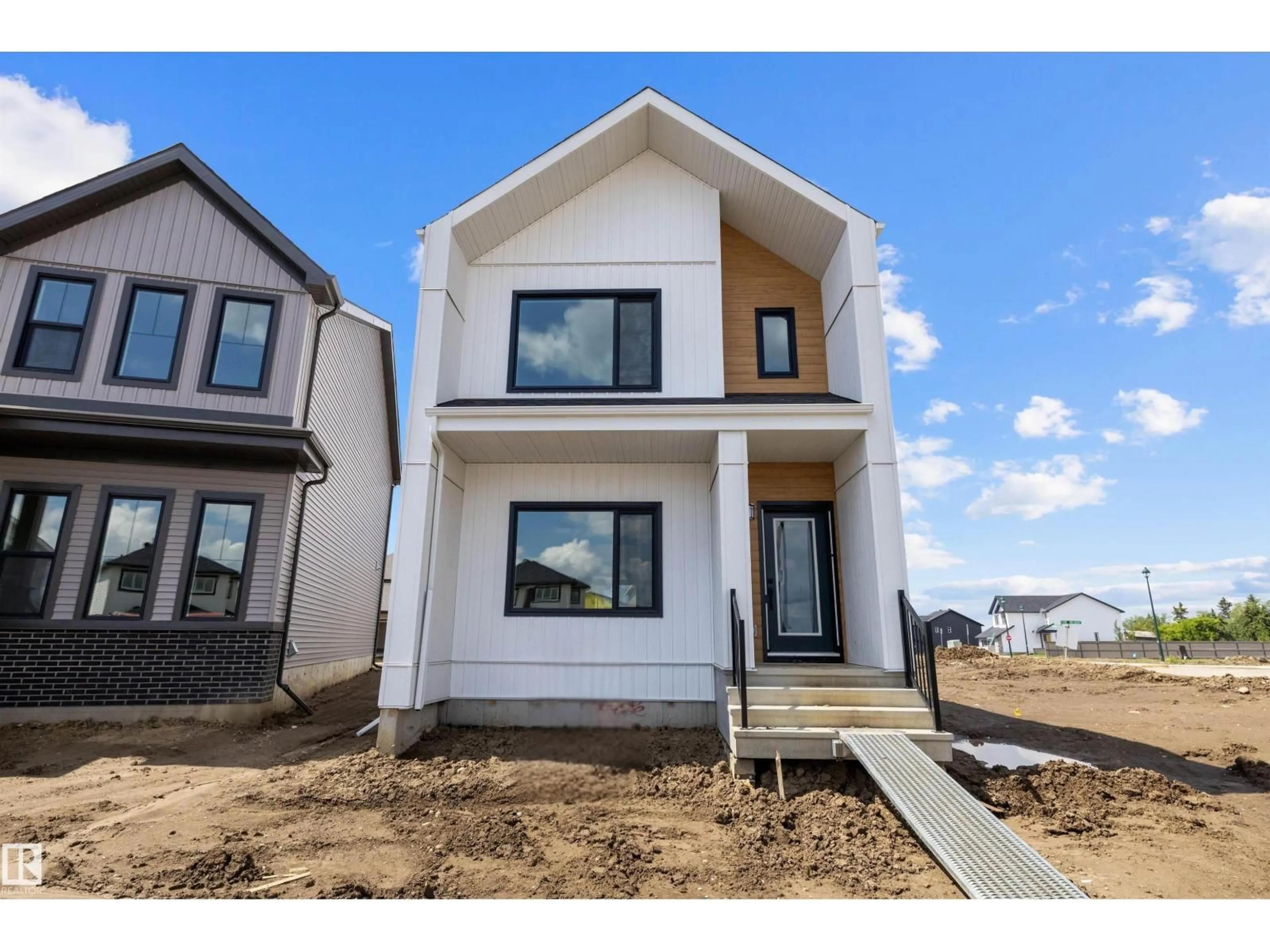 Home with vinyl exterior material, street for 133 MUSTANG CL, Ardrossan Alberta T8E0C1