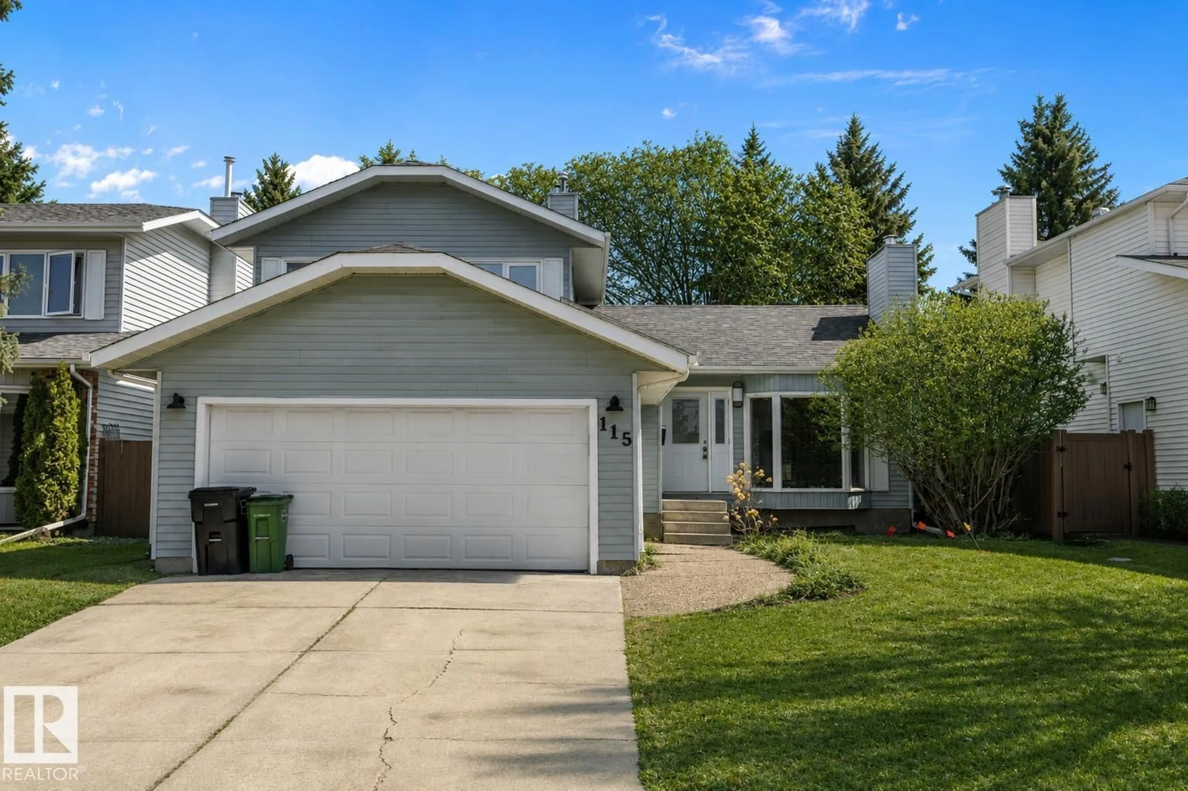 Home with vinyl exterior material, street for 115 WALKER RD, Edmonton Alberta T5T4C2