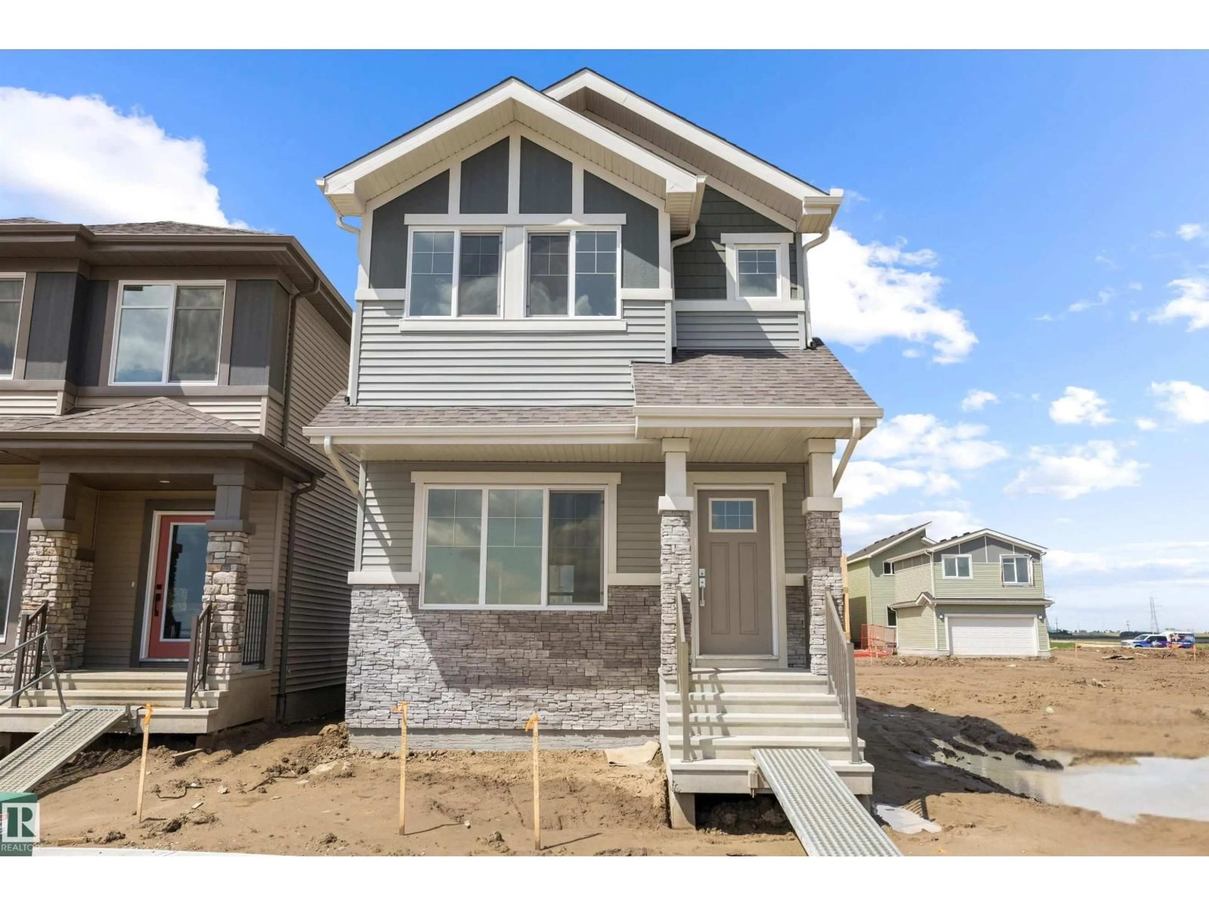 Home with vinyl exterior material, street for NE - 15656 3 ST, Edmonton Alberta T5Y4M3