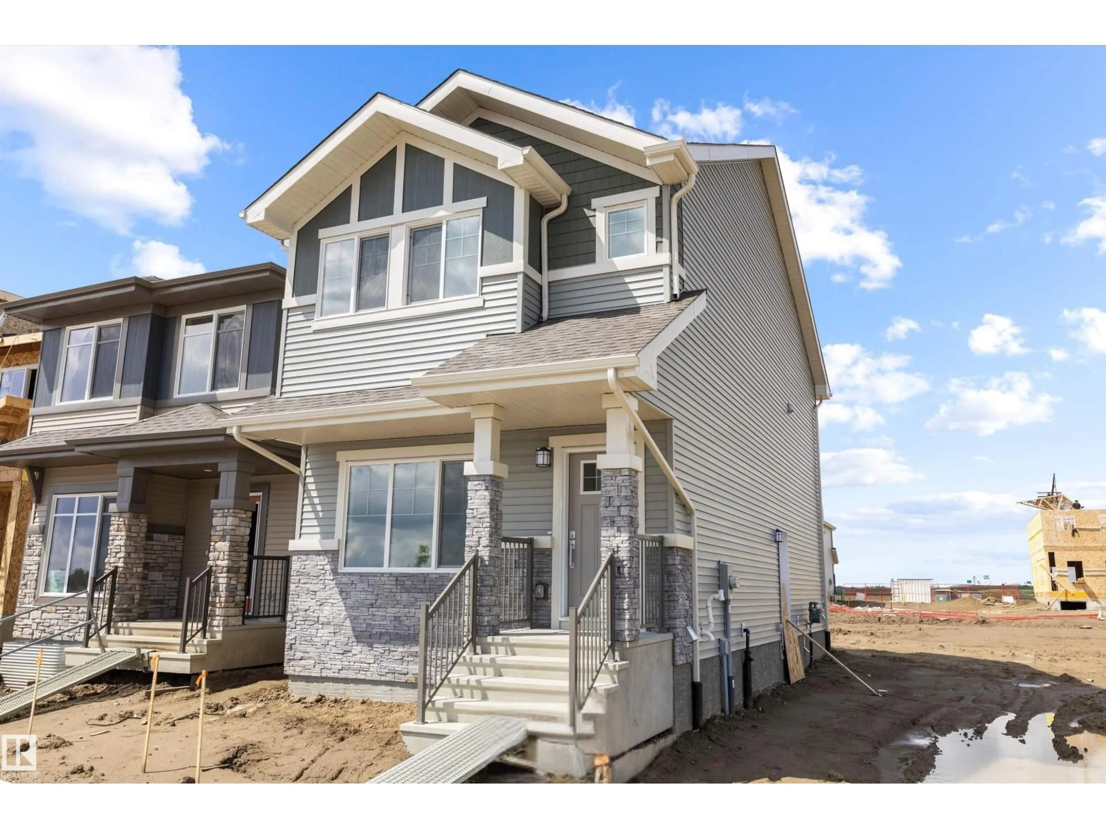 Home with vinyl exterior material, street for NE - 15656 3 ST, Edmonton Alberta T5Y4M3