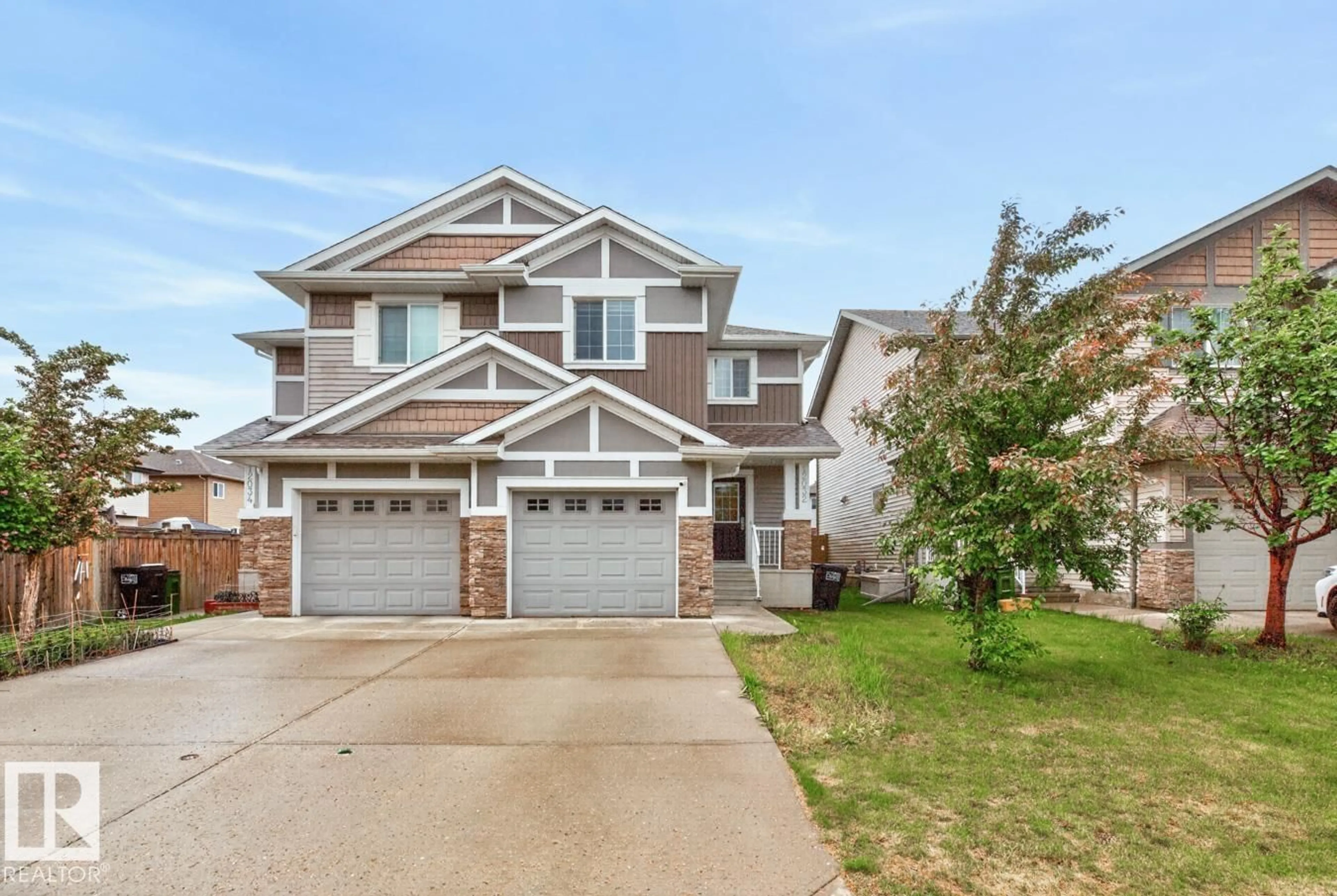 Home with vinyl exterior material, street for NW - 12032 167B AV, Edmonton Alberta T5X0G6