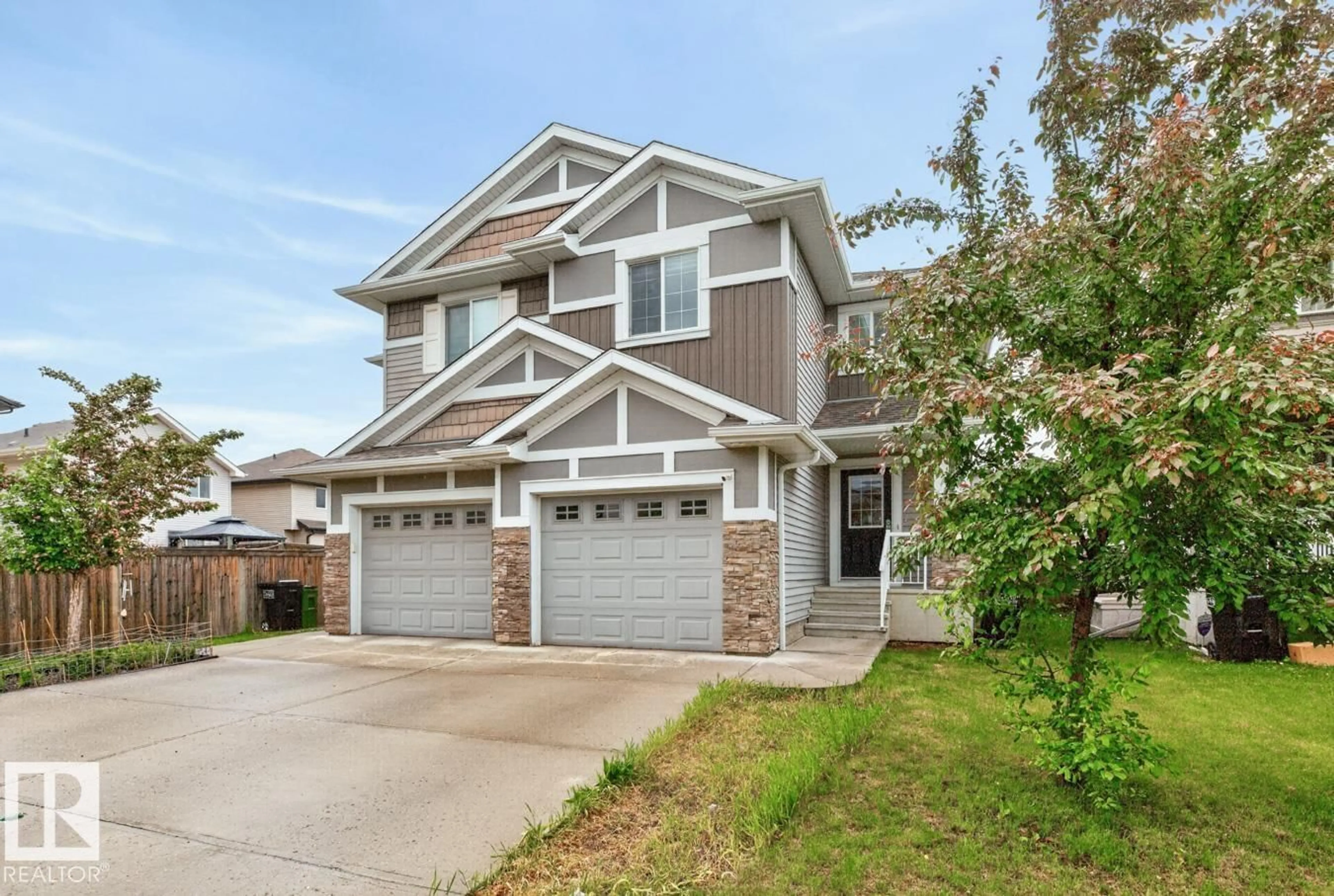 Home with vinyl exterior material, street for NW - 12032 167B AV, Edmonton Alberta T5X0G6