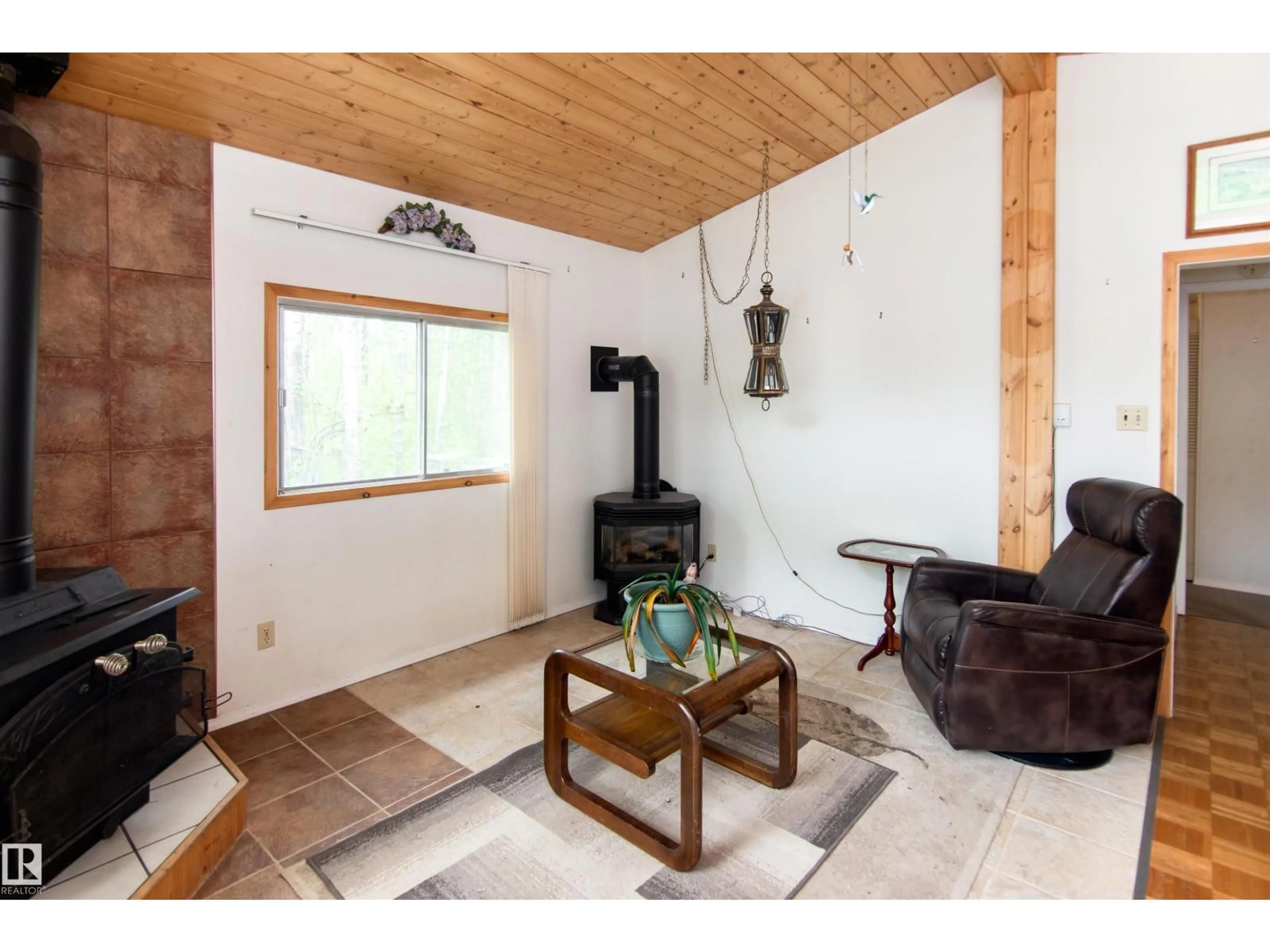 Living room with furniture, wood/laminate floor for 50 59318 RG RD RD, Rural Bonnyville M.D. Alberta T9N0H2