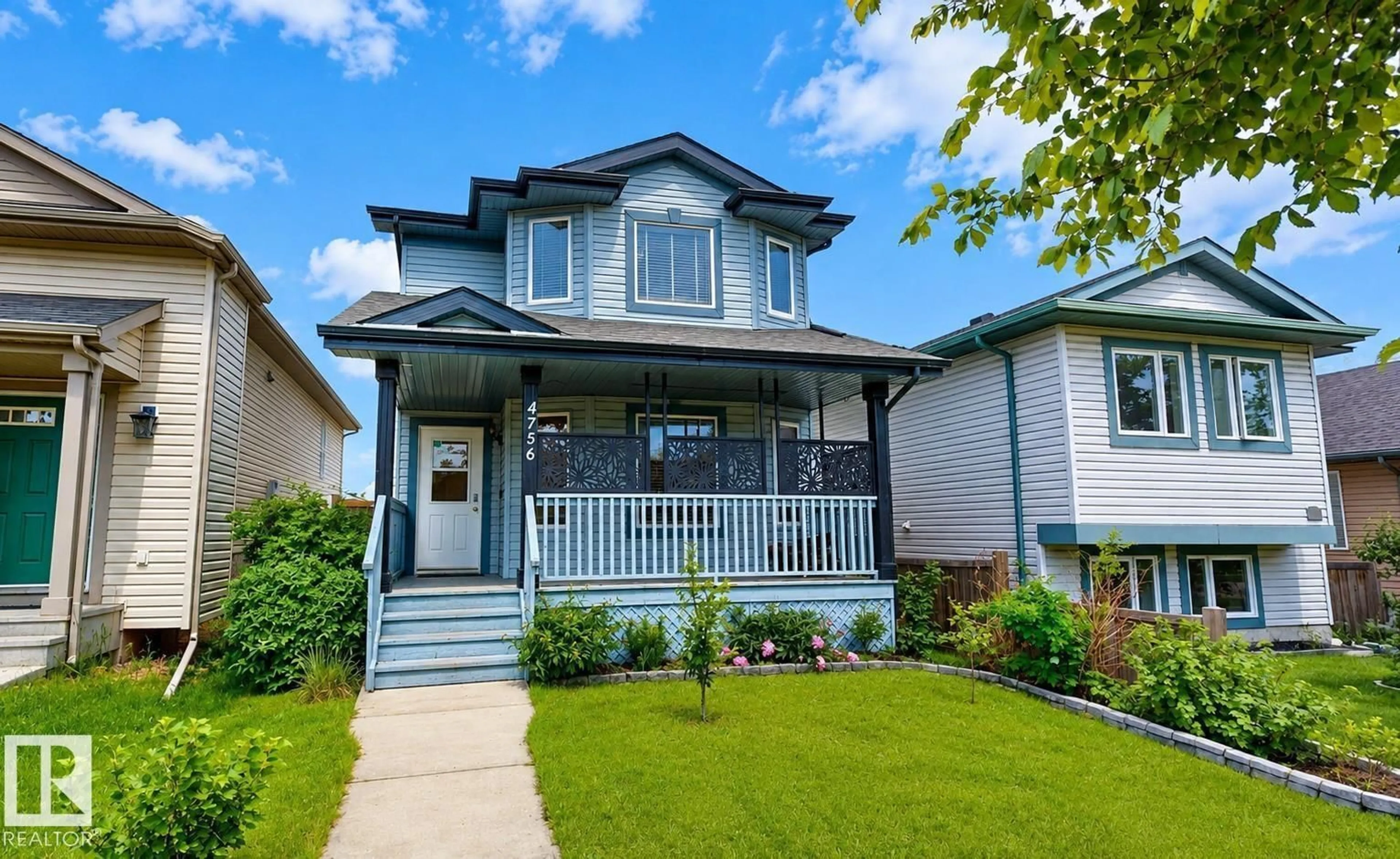 Home with vinyl exterior material, street for 4756 156 AV, Edmonton Alberta T5Y0B5
