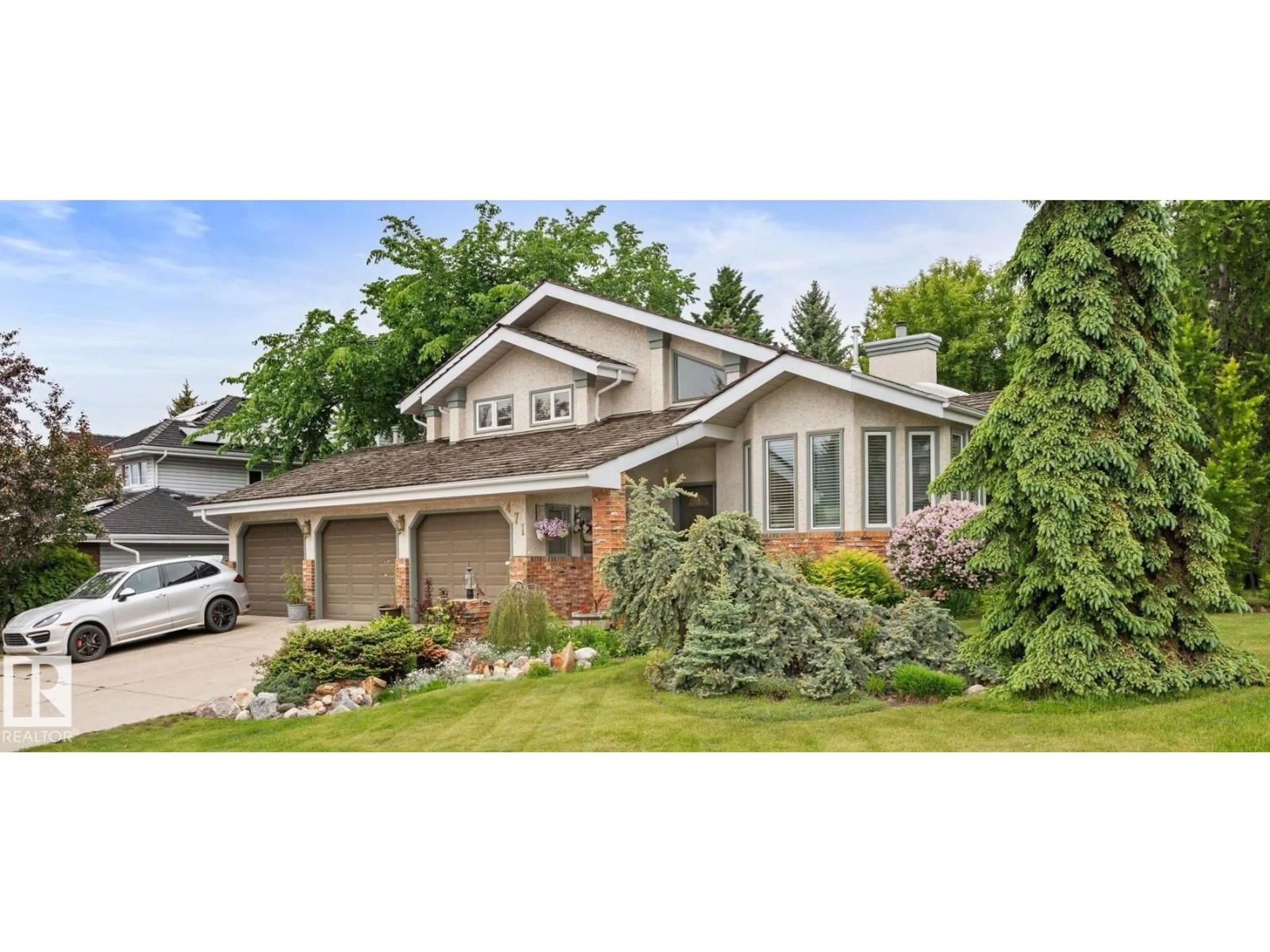 Home with vinyl exterior material, street for 471 RONNING ST, Edmonton Alberta T6R1Z2