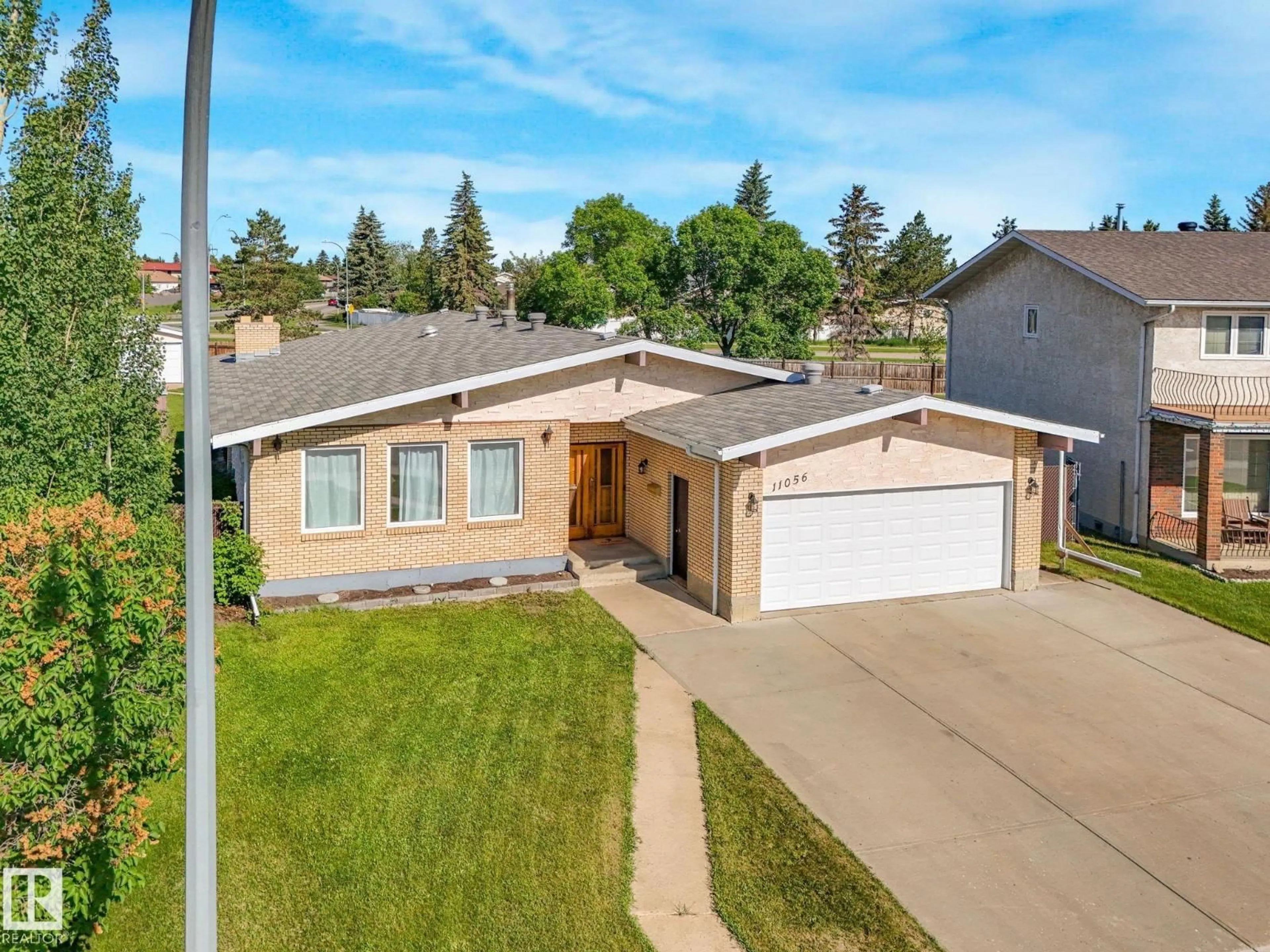 A pic from outside/outdoor area/front of a property/back of a property/a pic from drone, street for NW - 11056 166 AV, Edmonton Alberta T5X1Y3
