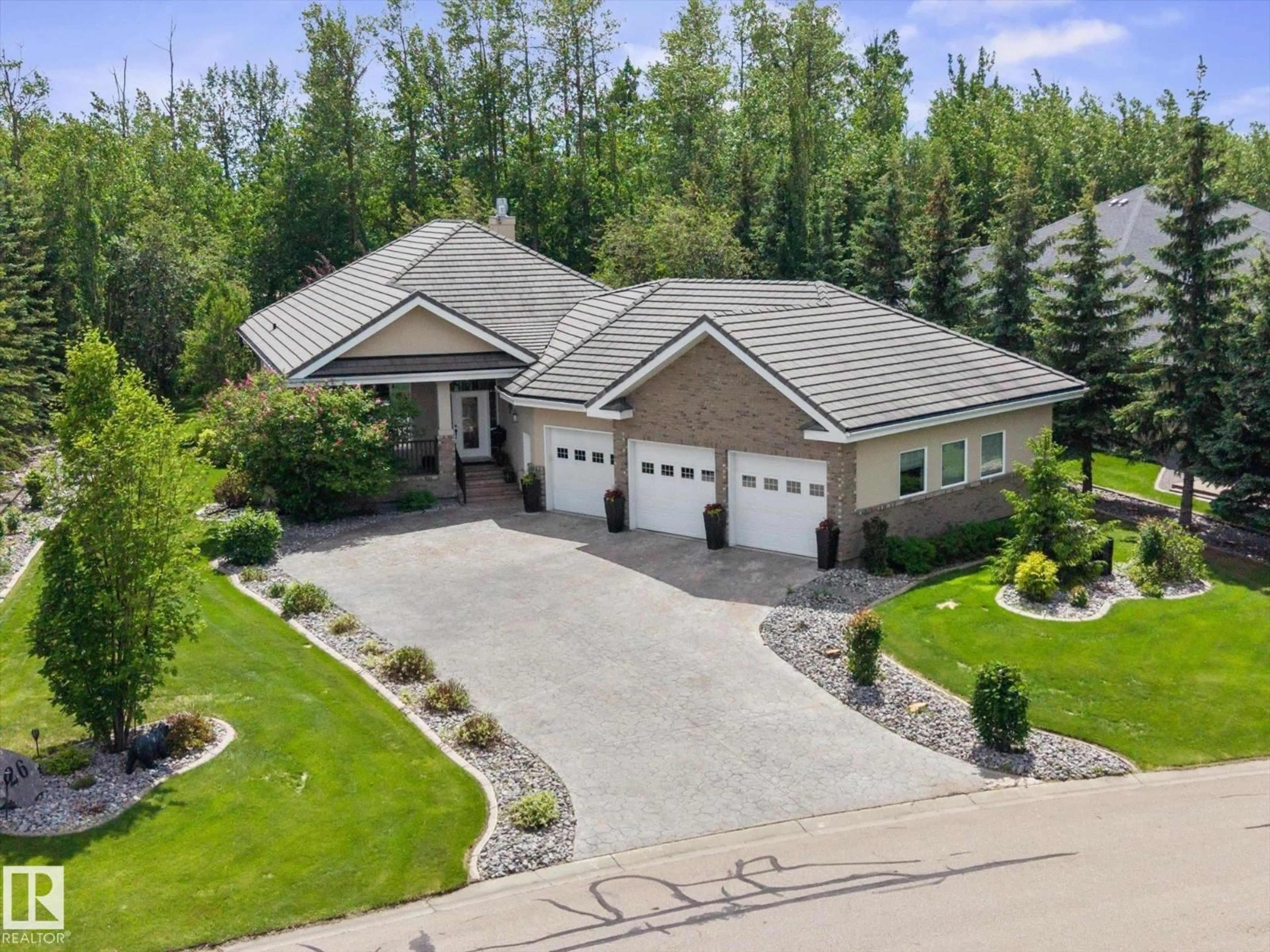 A pic from outside/outdoor area/front of a property/back of a property/a pic from drone, street for 26 - 51025 RGE ROAD 222, Rural Strathcona County Alberta T8C1J5