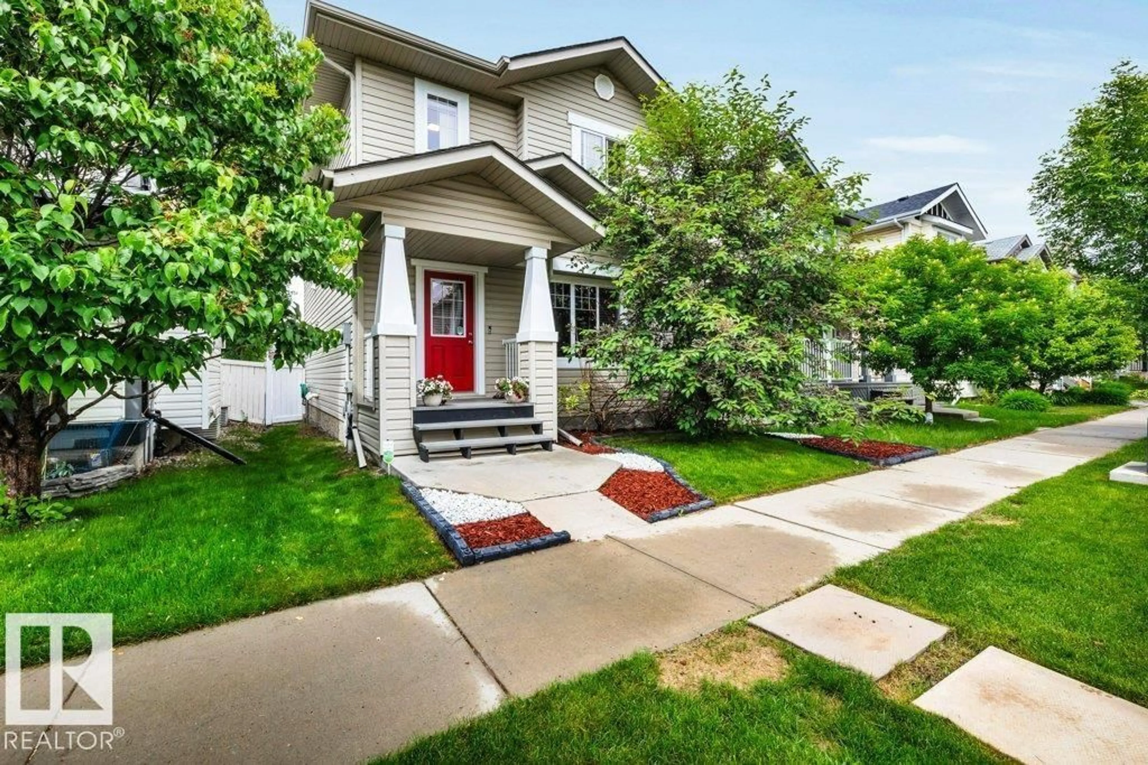 Home with vinyl exterior material, street for 7685 SCHMID CR, Edmonton Alberta T6R0K7