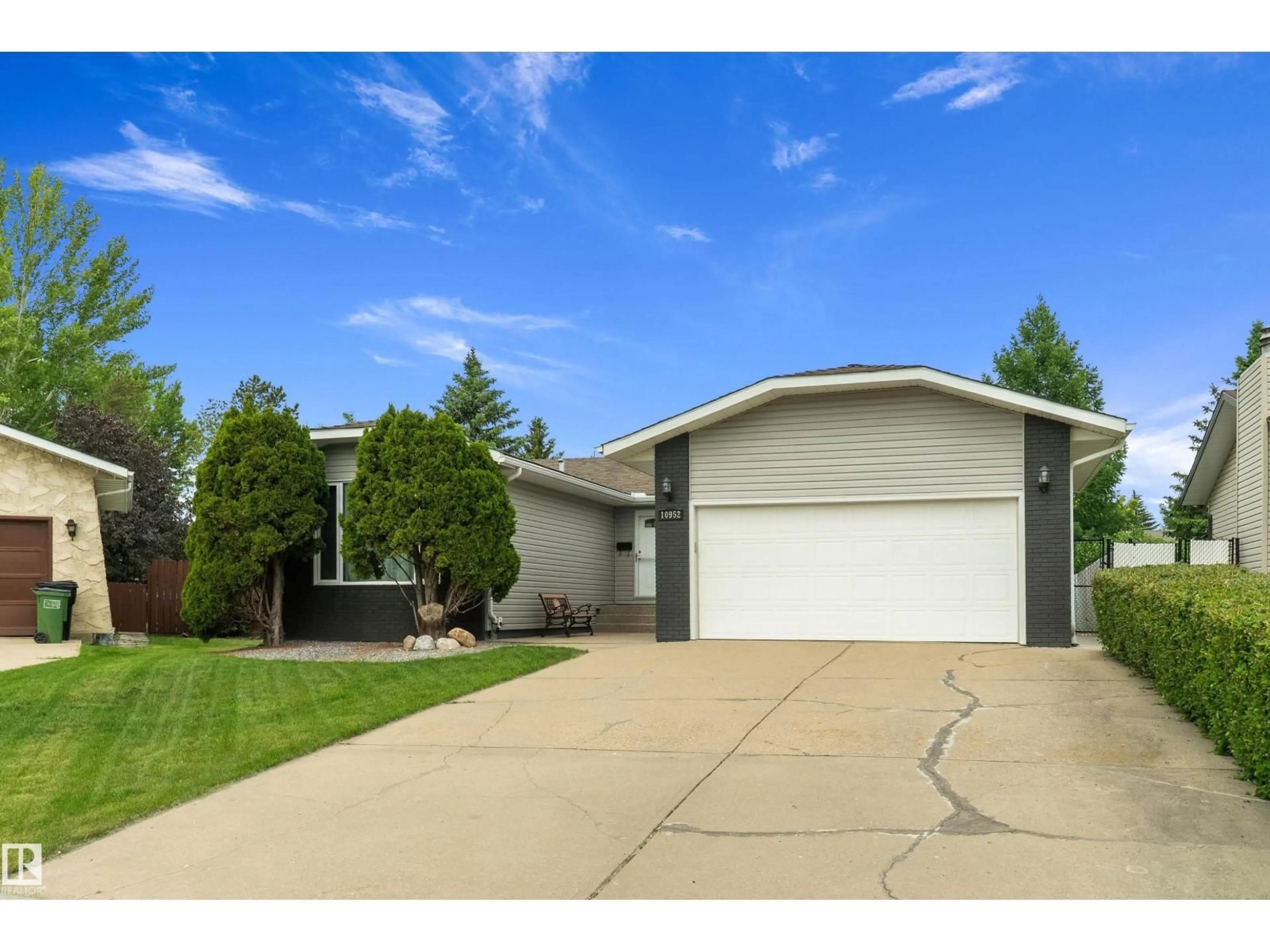 Home with vinyl exterior material, street for 10952 34A AV, Edmonton Alberta T6J2V1