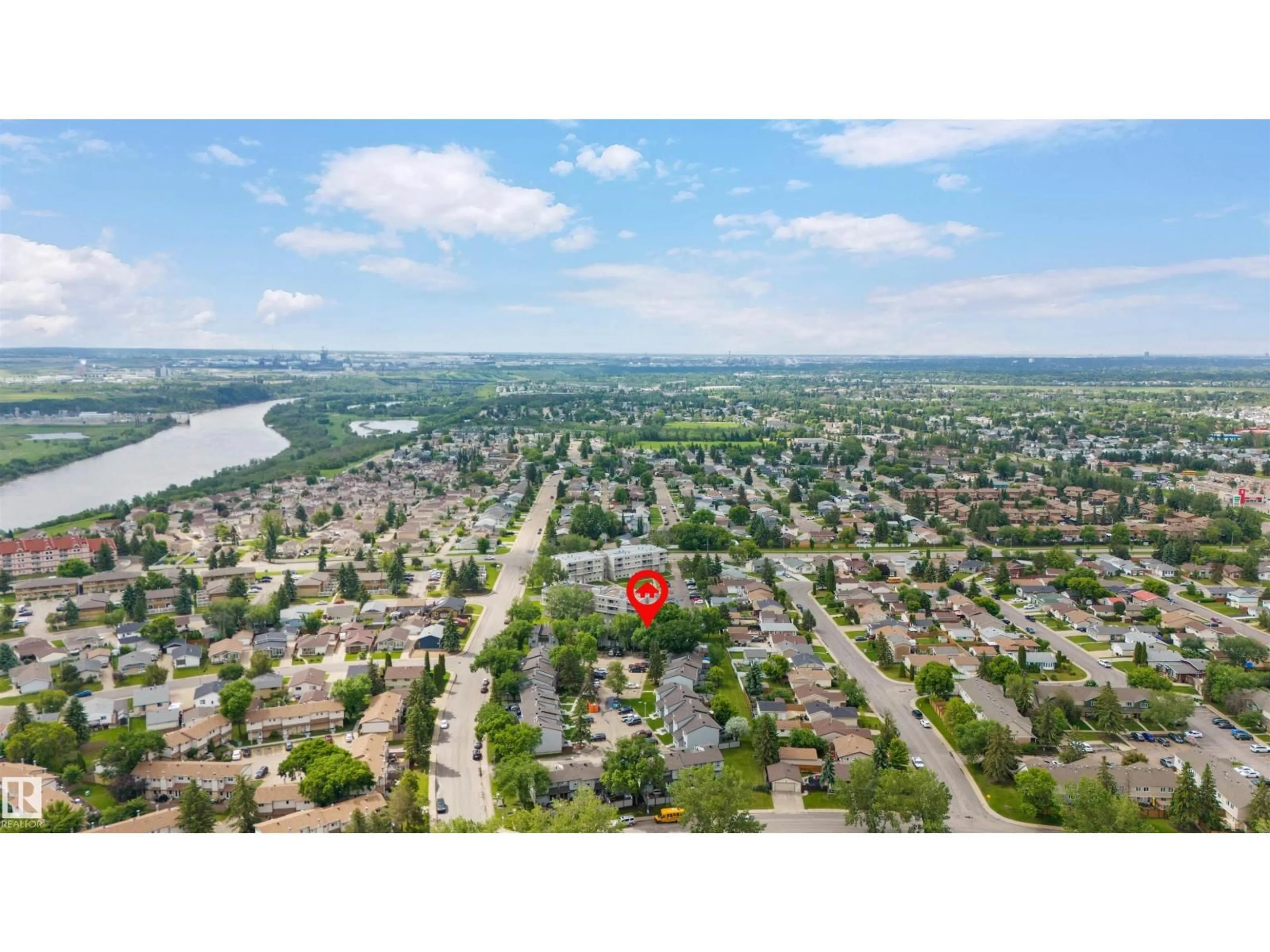 A pic from outside/outdoor area/front of a property/back of a property/a pic from drone, water/lake/river/ocean view for 13828 24 ST, Edmonton Alberta T5Y1B6