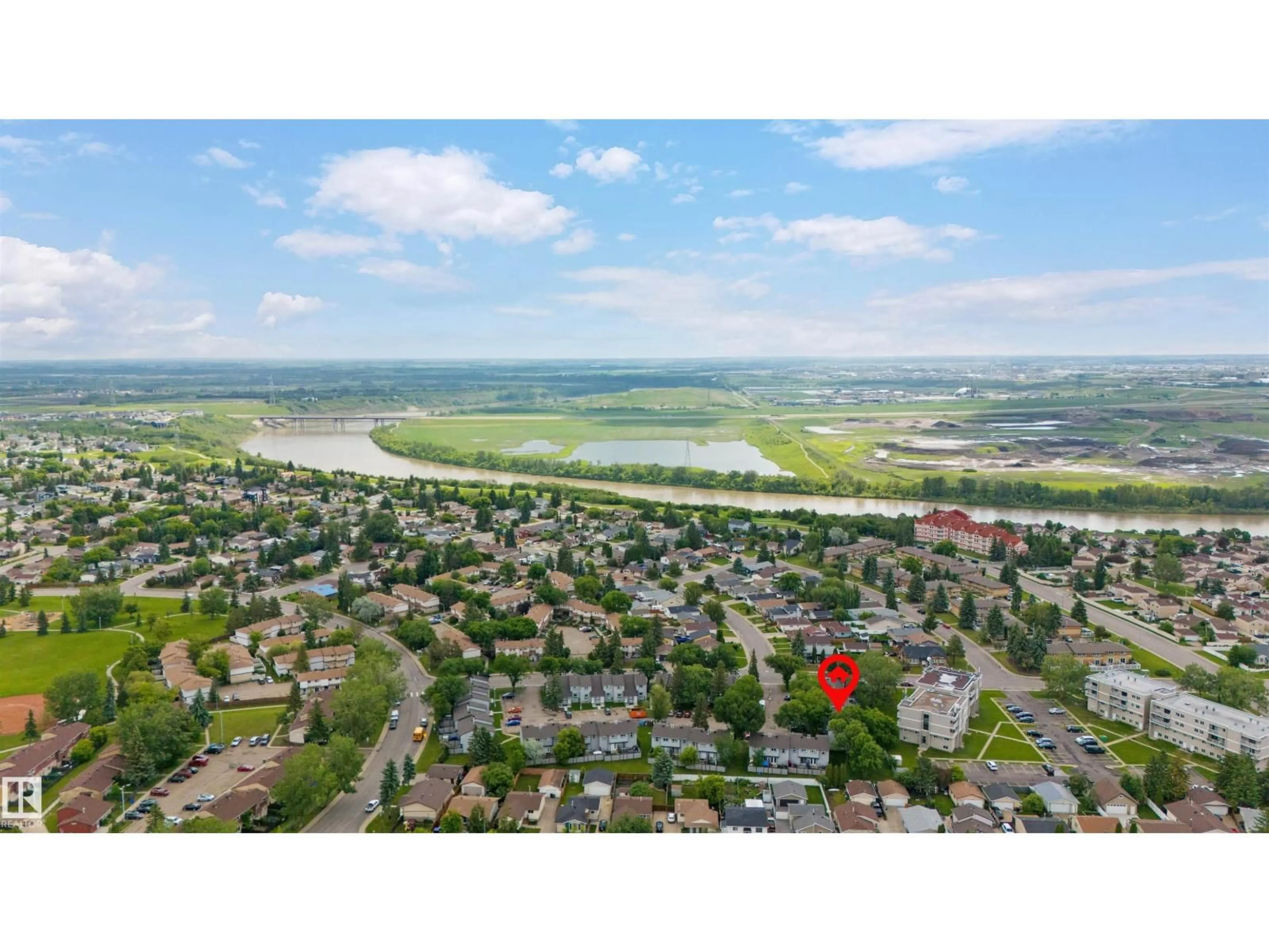A pic from outside/outdoor area/front of a property/back of a property/a pic from drone, water/lake/river/ocean view for 13828 24 ST, Edmonton Alberta T5Y1B6