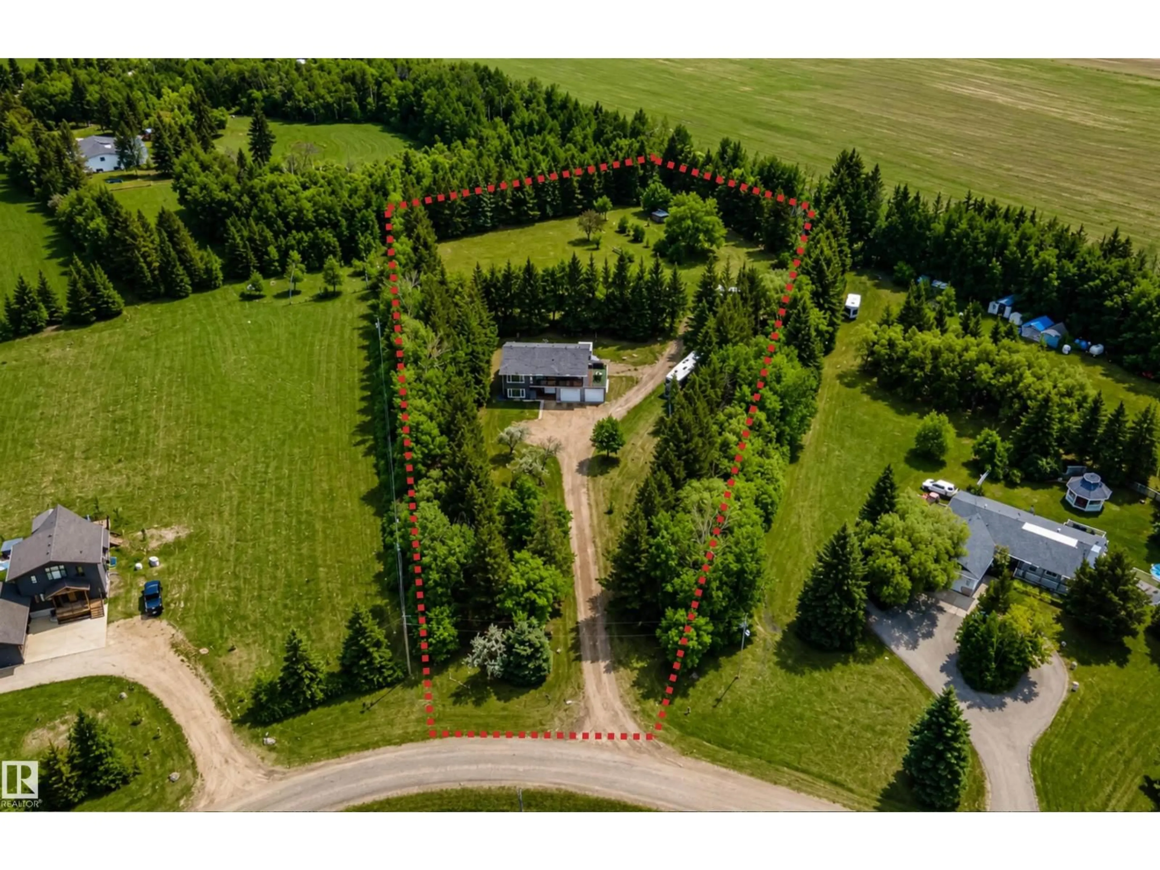 A pic from outside/outdoor area/front of a property/back of a property/a pic from drone, unknown for 50047 - 70 RGE RD 244, Rural Leduc County Alberta T4X0N8