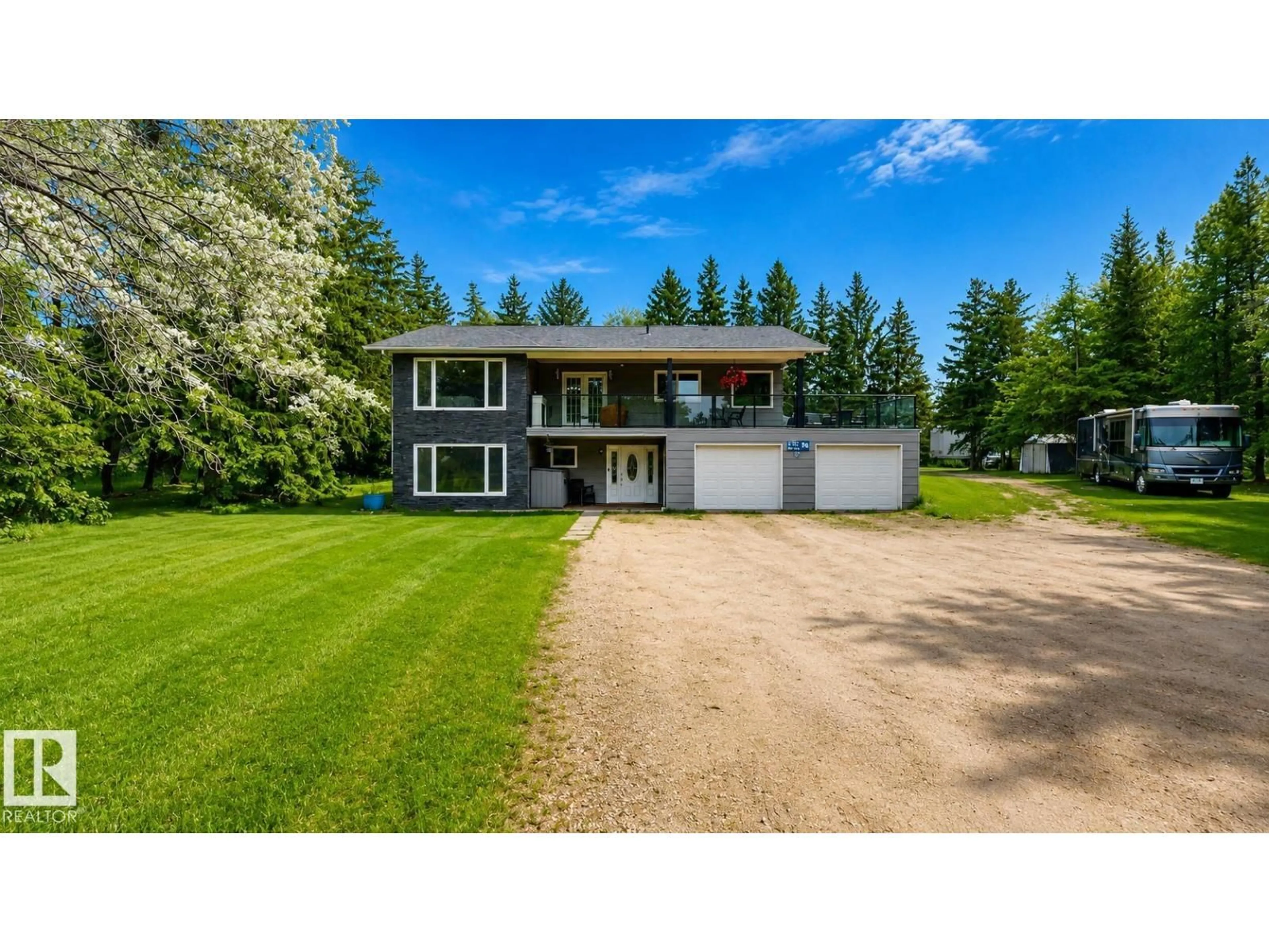 A pic from outside/outdoor area/front of a property/back of a property/a pic from drone, street for 50047 - 70 RGE RD 244, Rural Leduc County Alberta T4X0N8