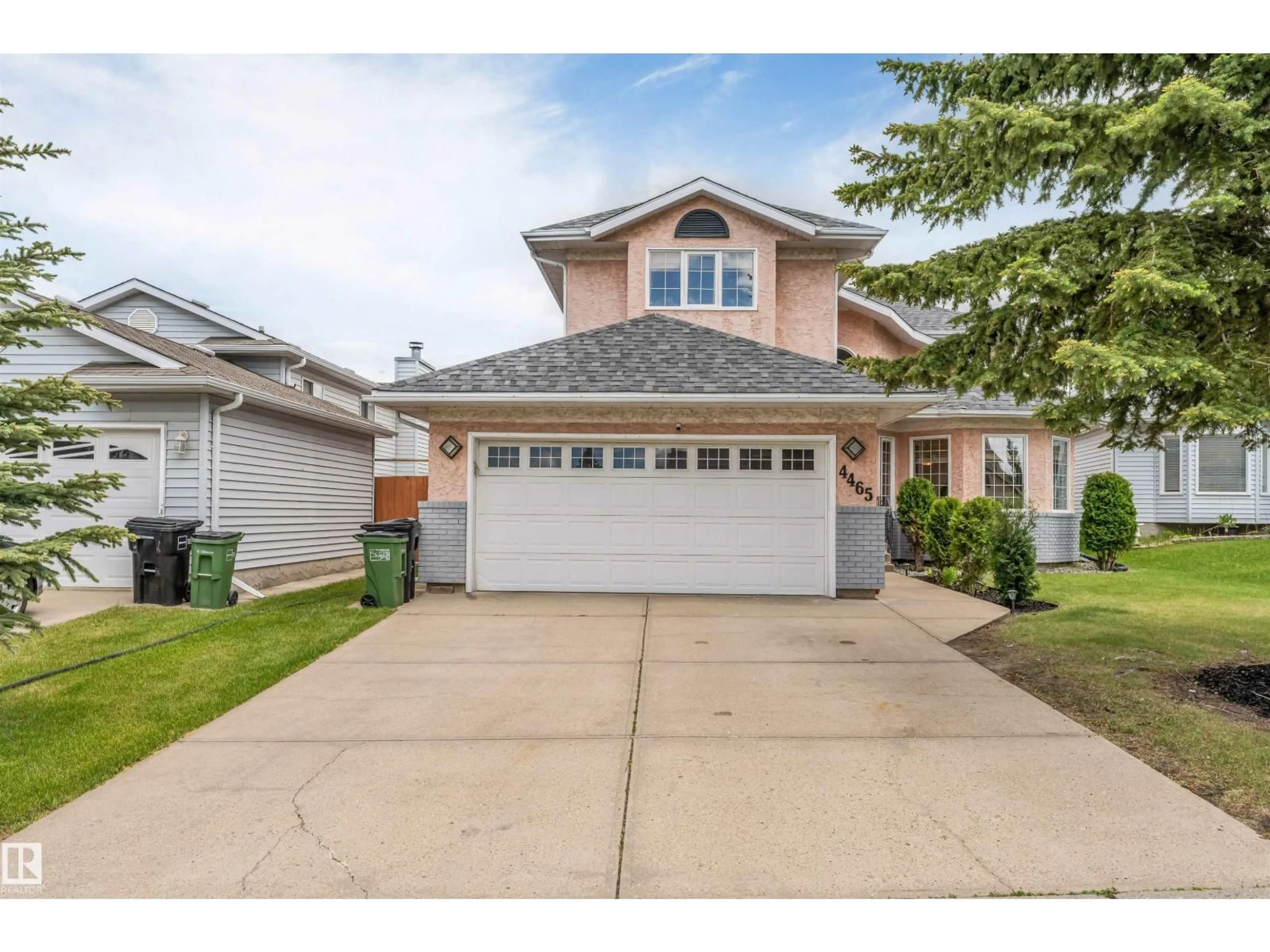 Home with vinyl exterior material, street for 4465 32A ST NW, Edmonton Alberta T6T1E8