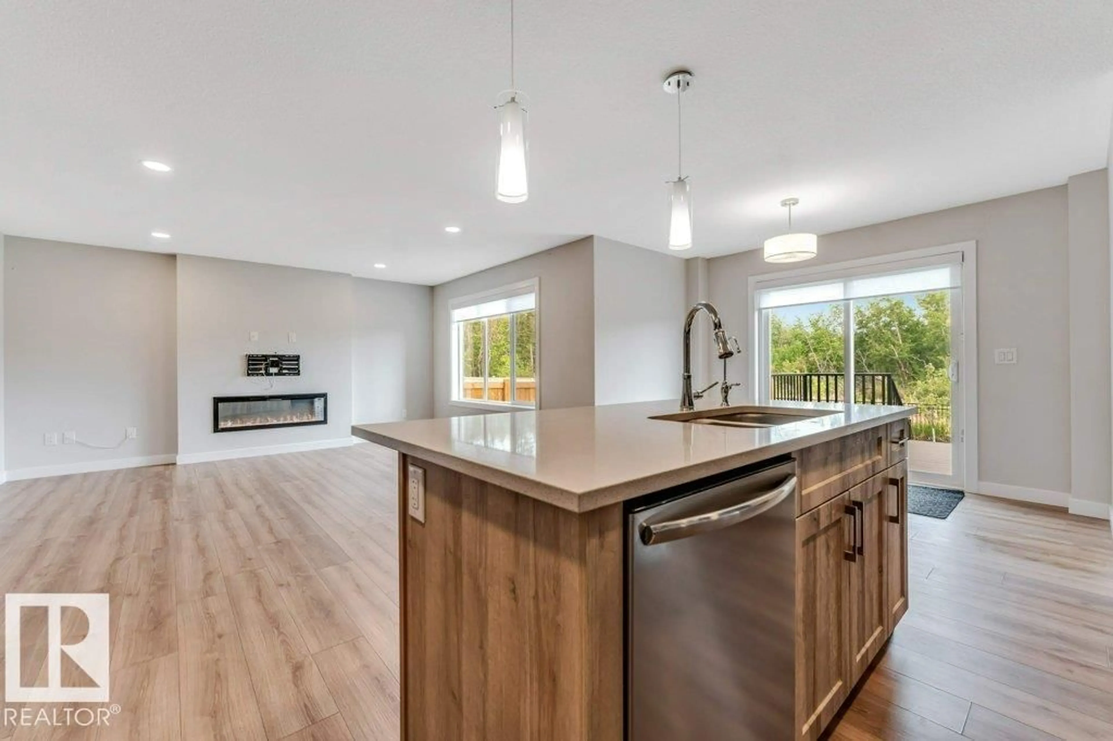 Open concept kitchen, wood/laminate floor for 403 35 AV, Edmonton Alberta T6T2P8