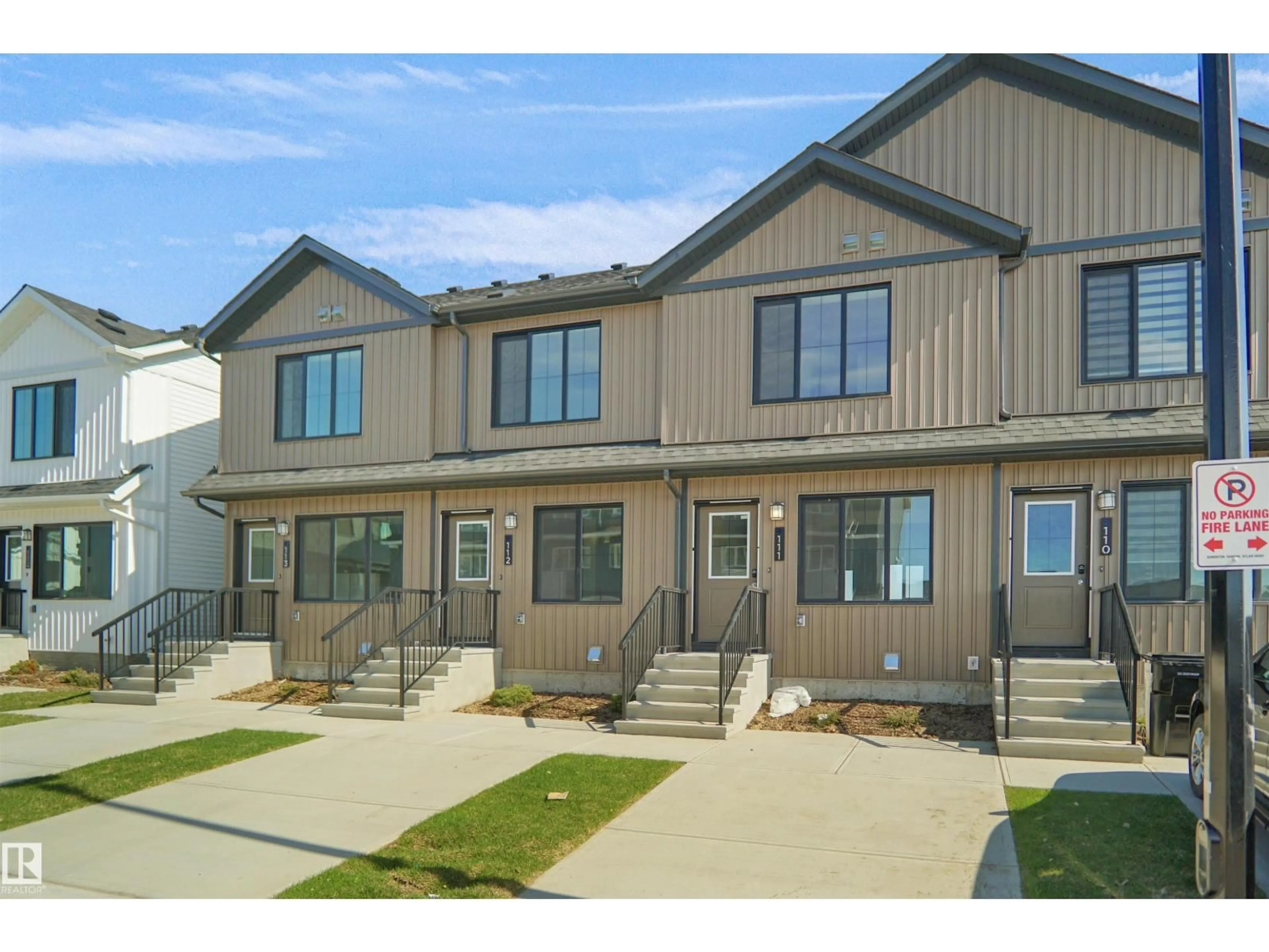 Home with vinyl exterior material, street for #115 - 1009 CY BECKER RD, Edmonton Alberta T5Y4B7