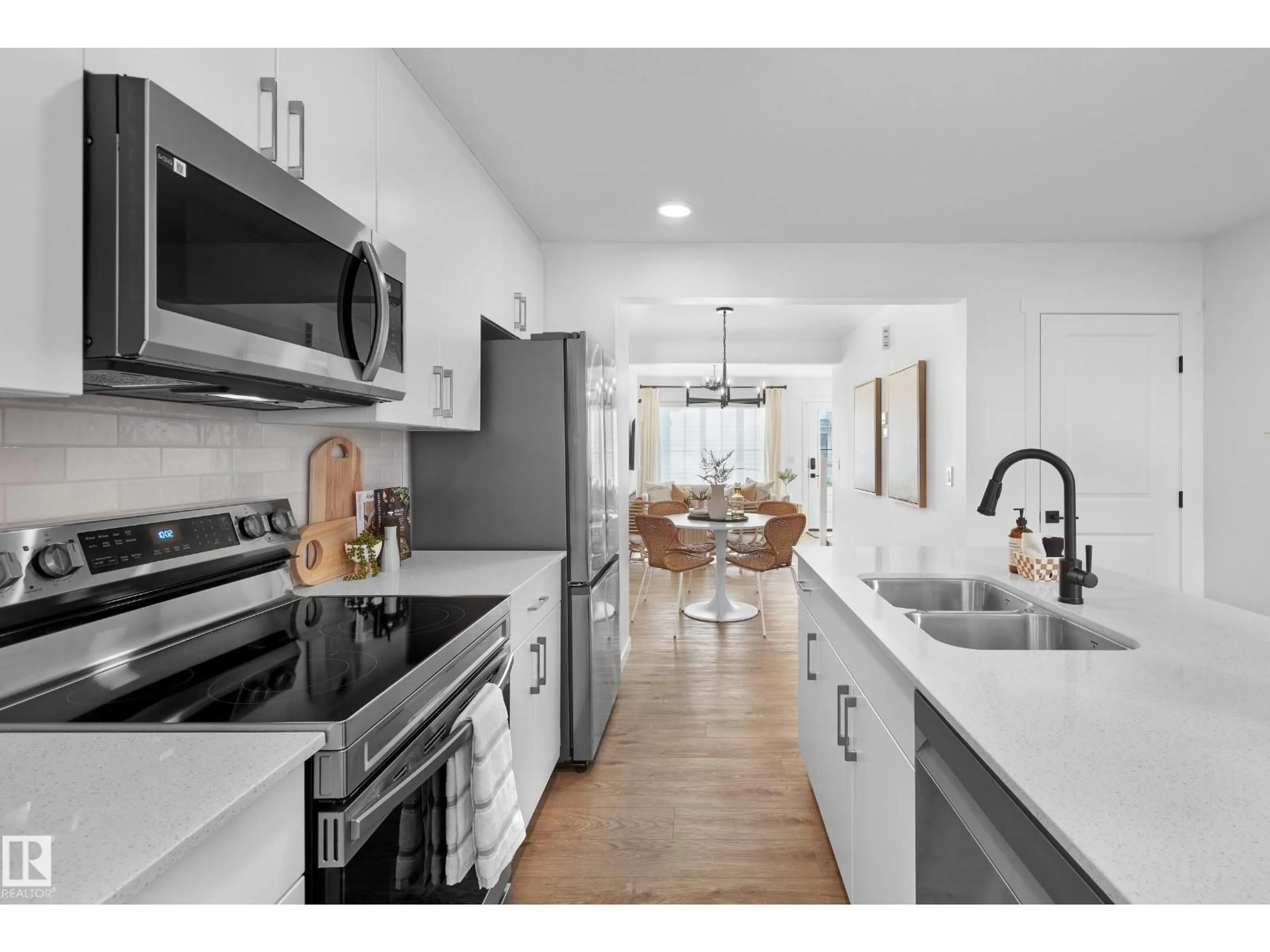 Open concept kitchen, ceramic/tile floor for 18 - 3705 141 ST, Edmonton Alberta T6W5M9