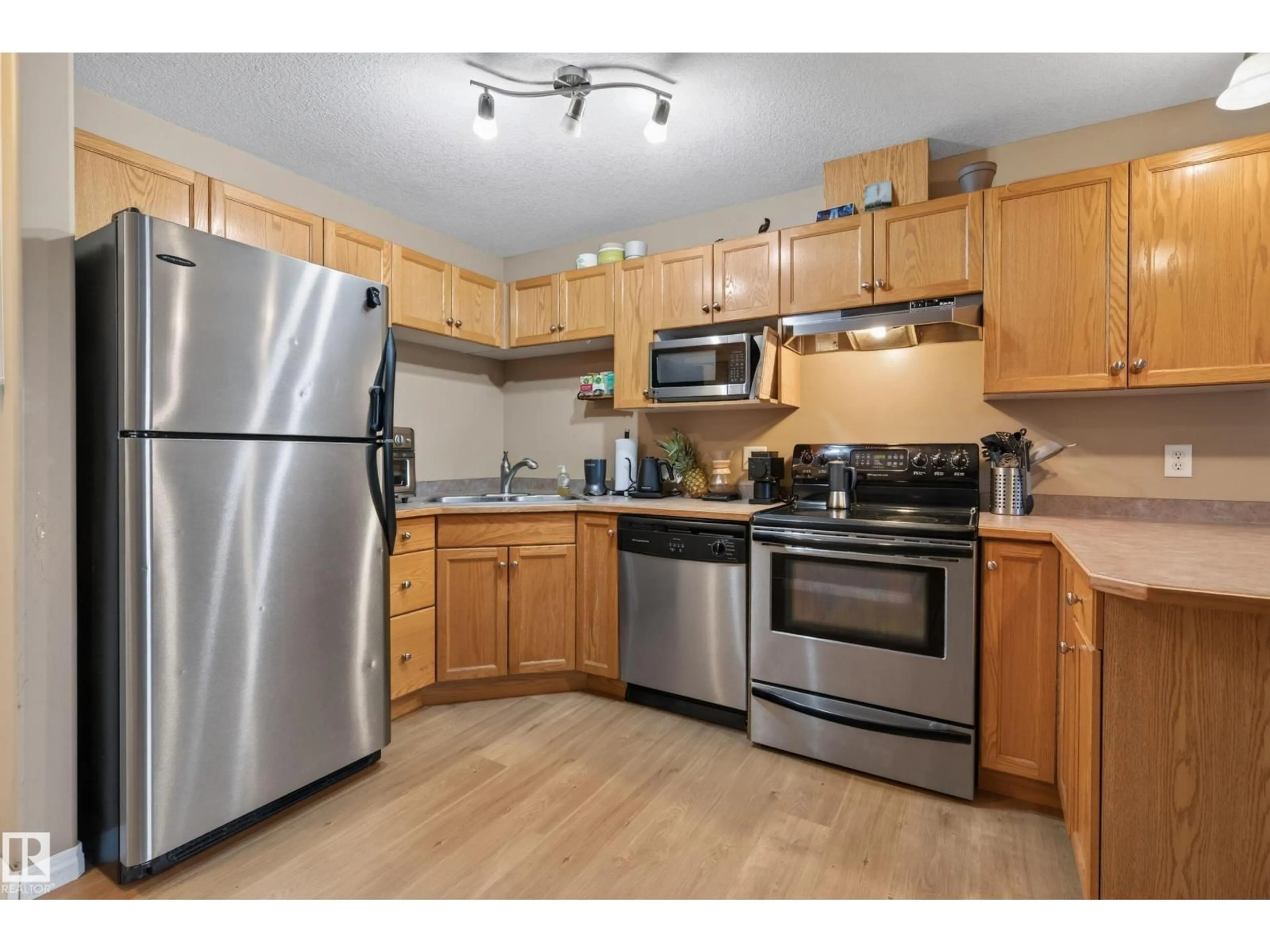 Standard kitchen, wood/laminate floor for #321 - 7511 171 ST, Edmonton Alberta T5T6S7