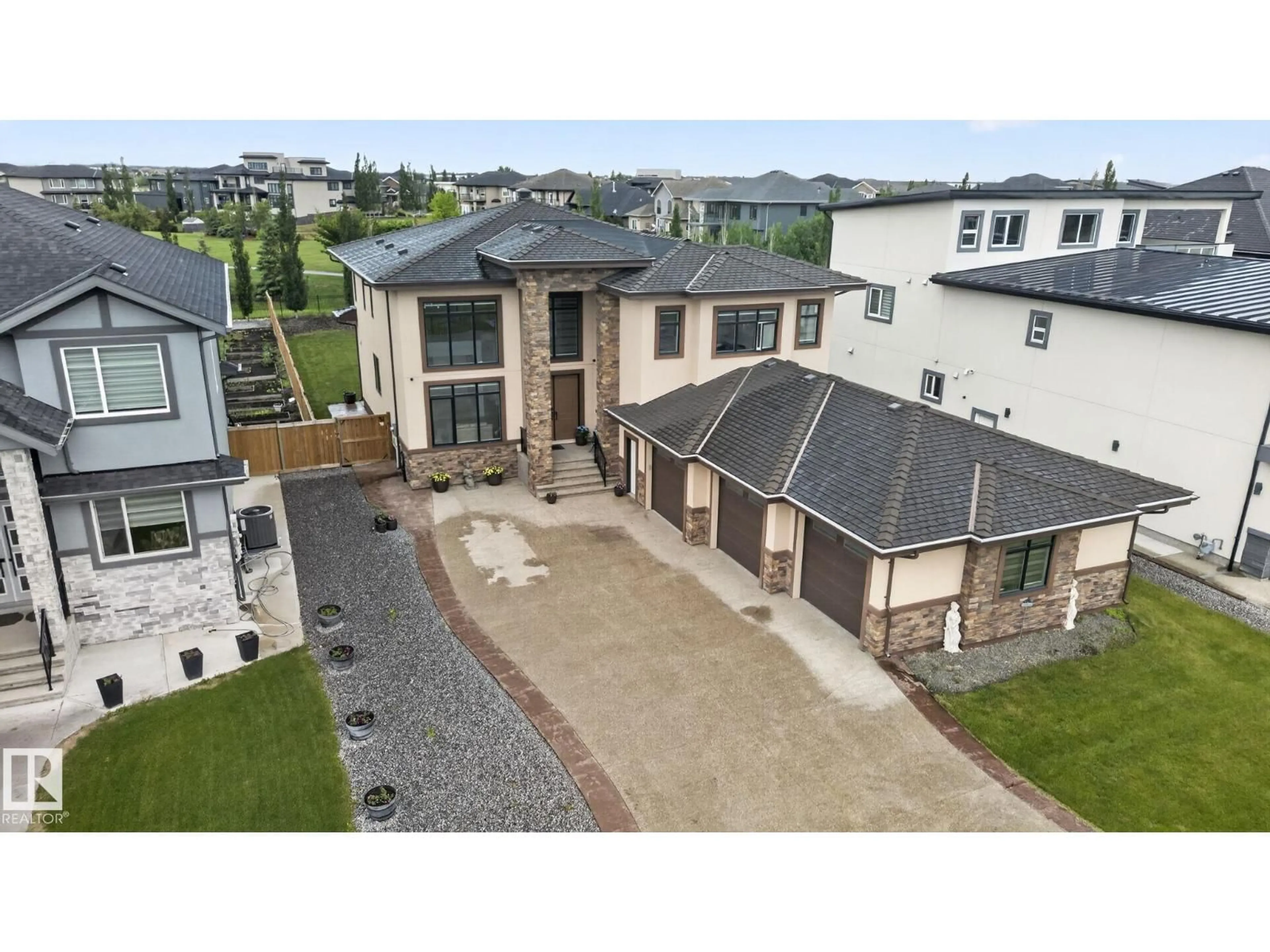 A pic from outside/outdoor area/front of a property/back of a property/a pic from drone, building for NE - 5928 30 ST, Rural Leduc County Alberta T4X0X9