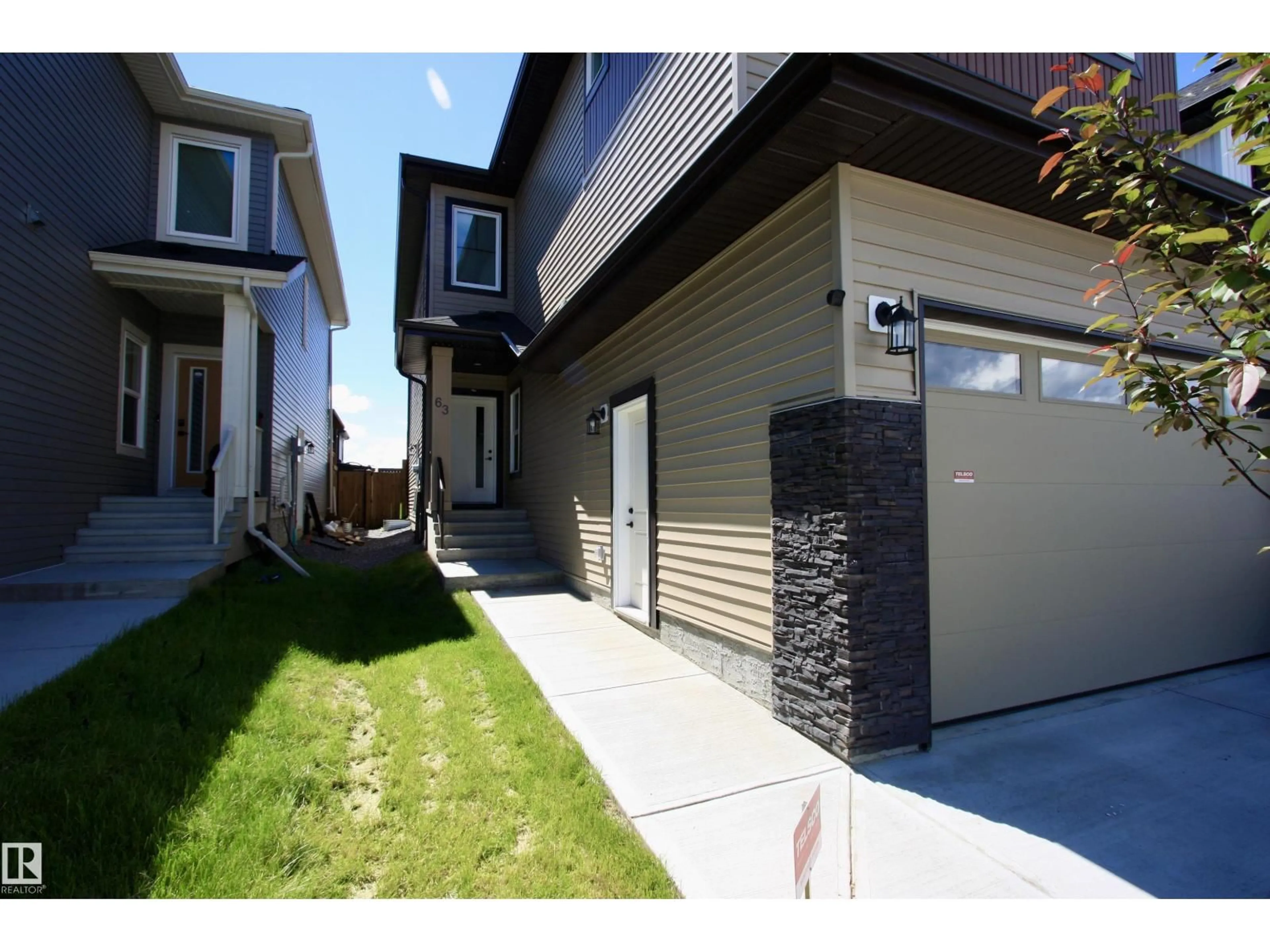 Home with brick exterior material, street for 63 PENN PL, Spruce Grove Alberta T7X2W7