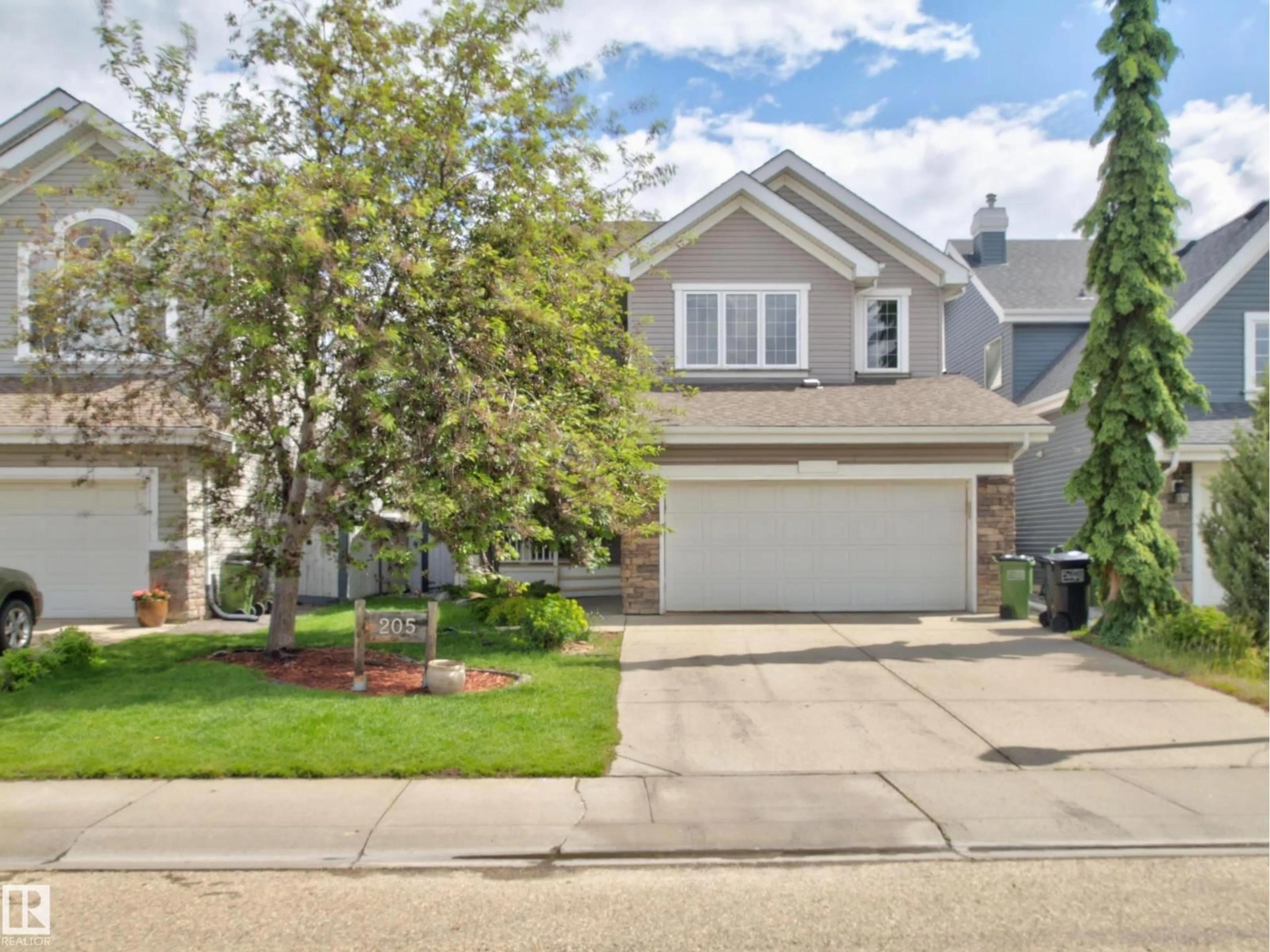 Home with vinyl exterior material, street for SW - 205 SHEPPARD CO, Edmonton Alberta T6X1B3
