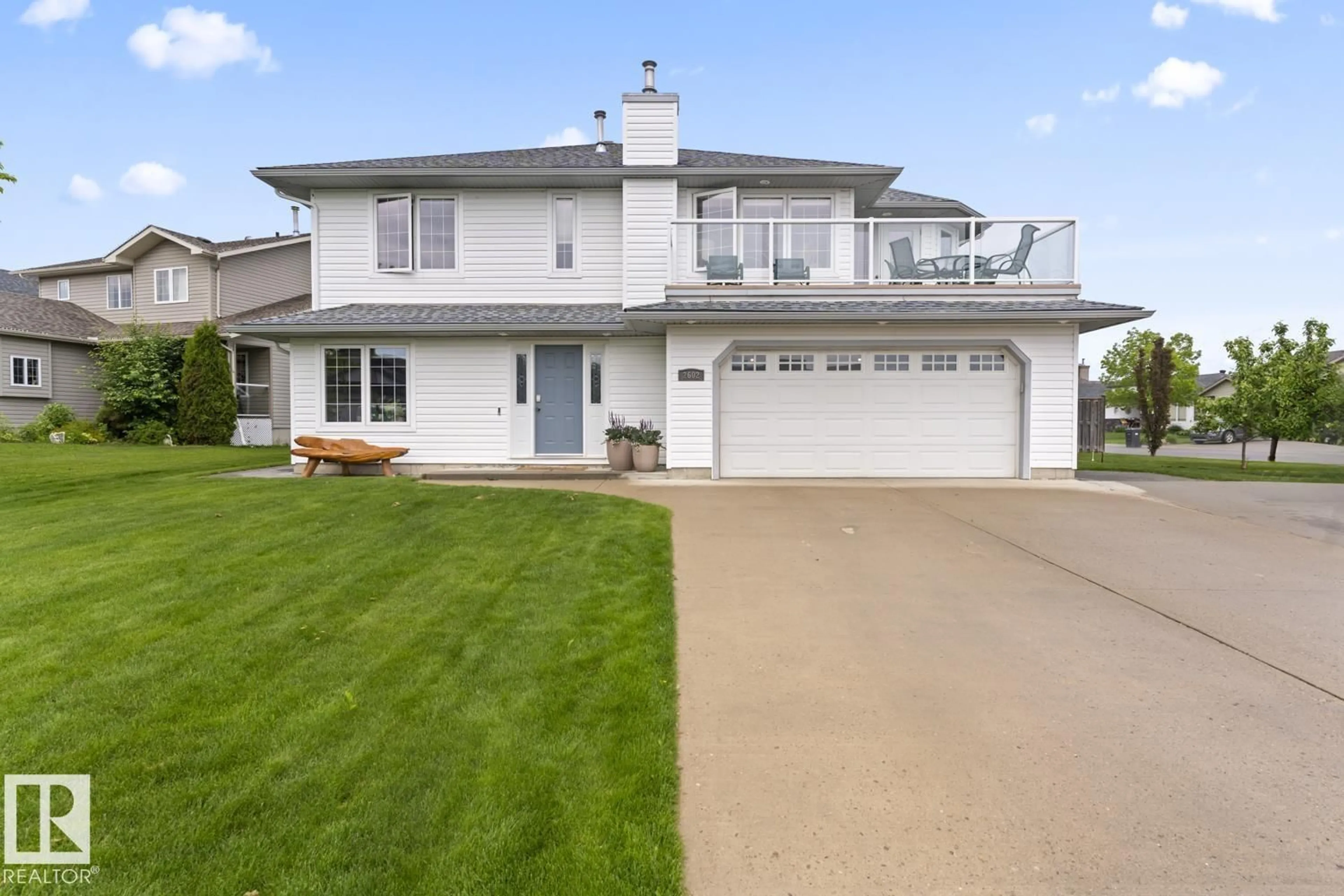 Home with vinyl exterior material, street for 2602 DELTA RD, Cold Lake Alberta T9M1X8