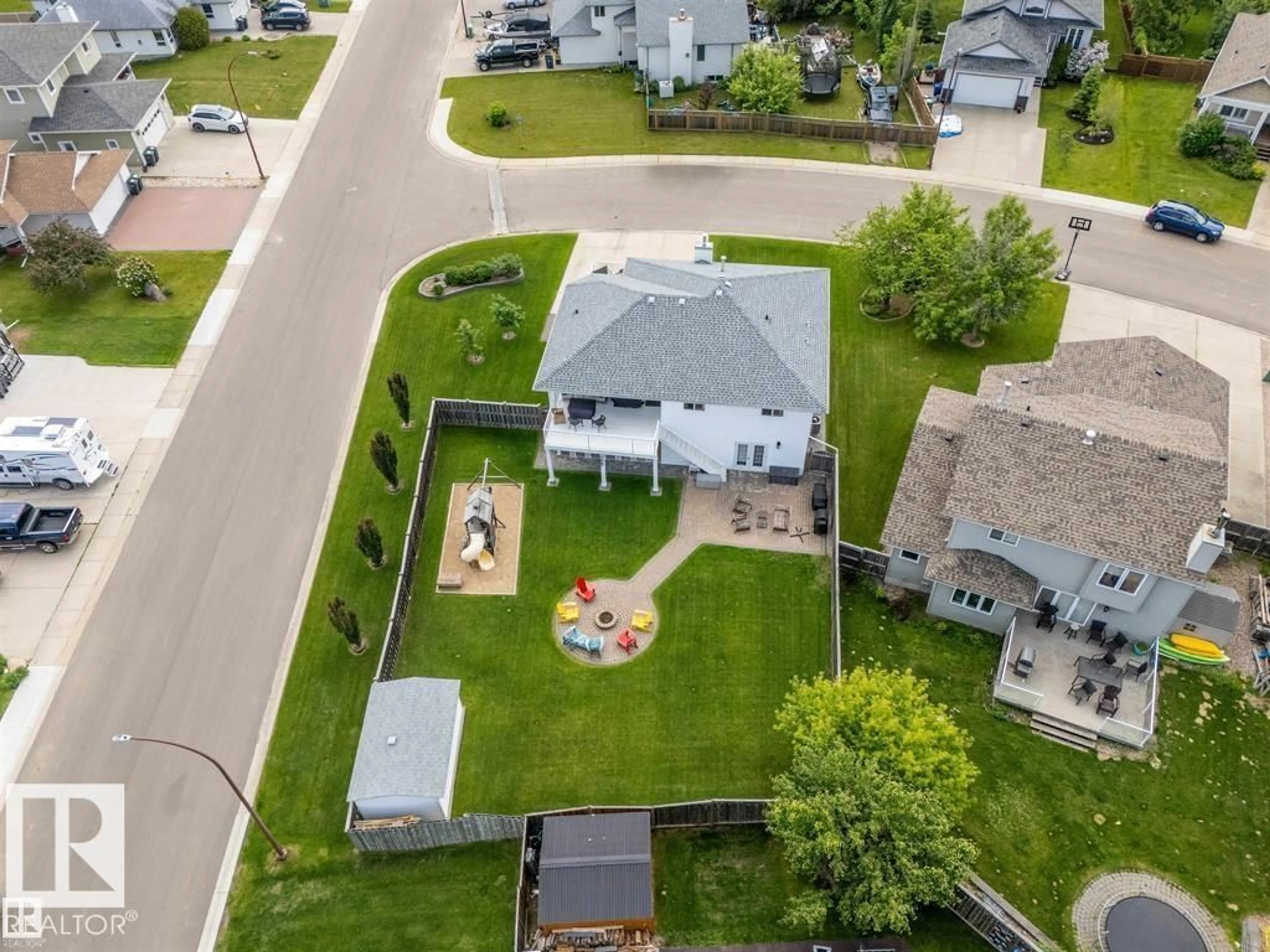 A pic from outside/outdoor area/front of a property/back of a property/a pic from drone, street for 2602 DELTA RD, Cold Lake Alberta T9M1X8