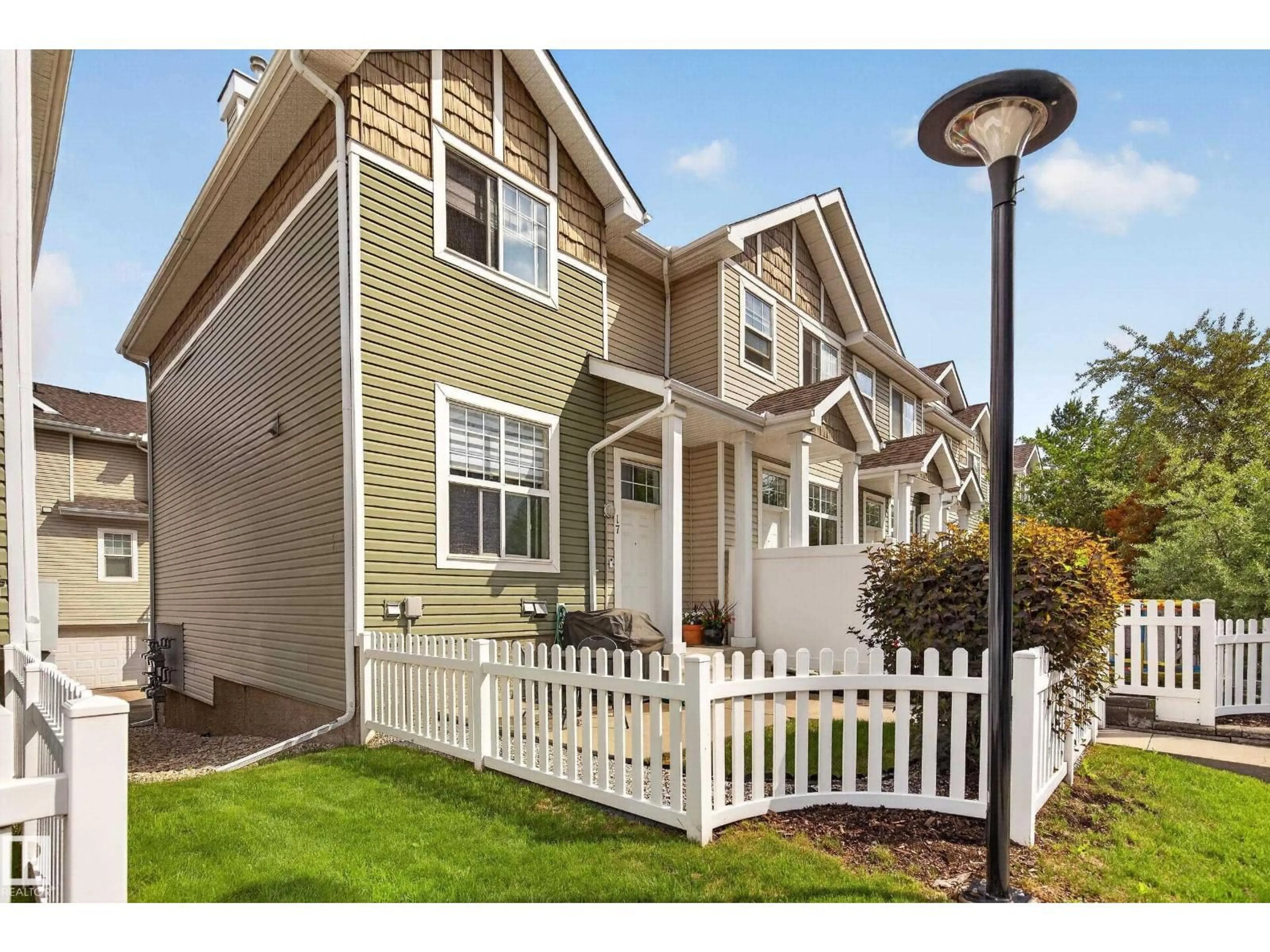 Home with vinyl exterior material, street for 17 - 5604 199 ST NW, Edmonton Alberta T6M2Z9