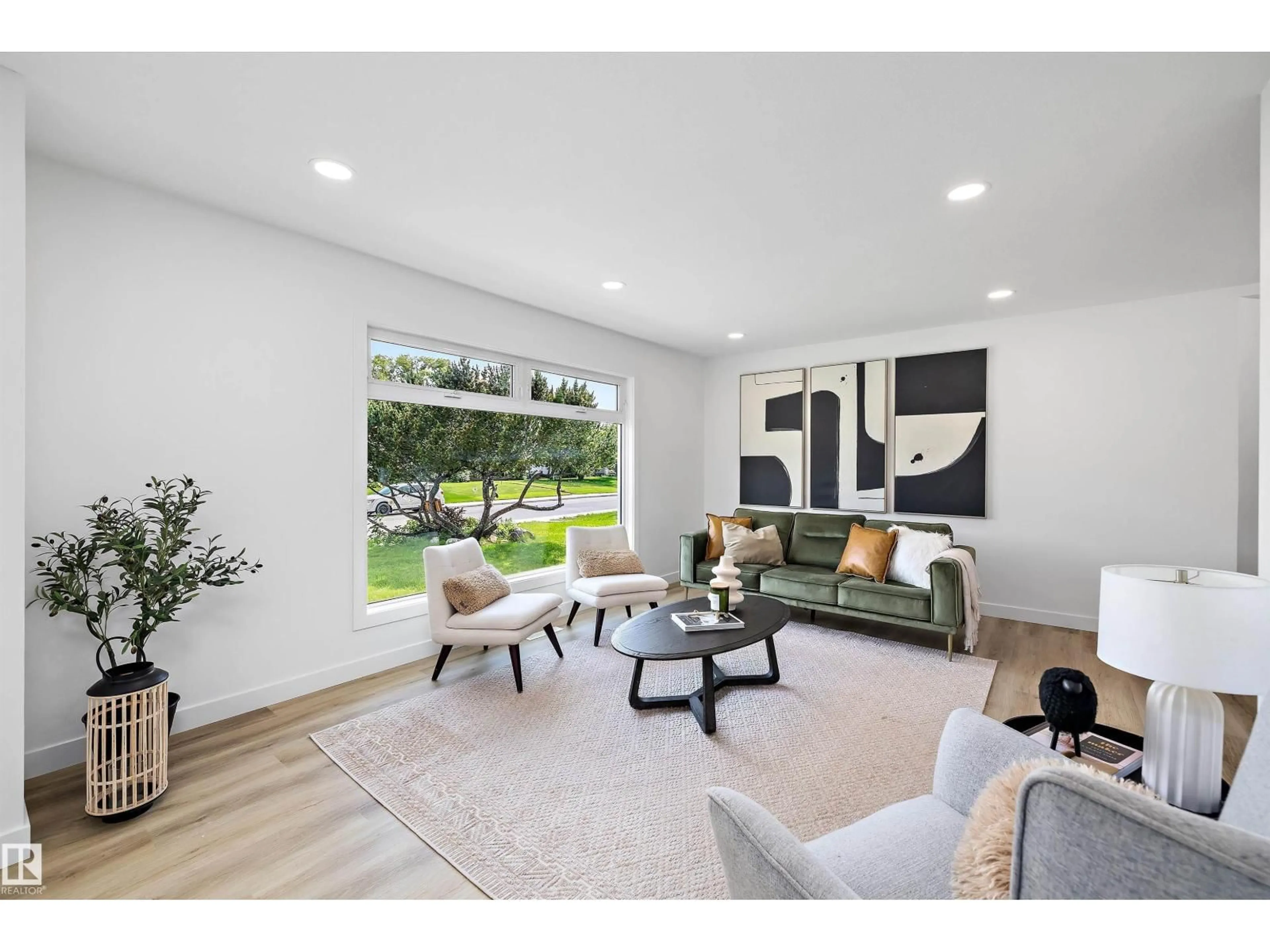 Living room with furniture, unknown for 7004 93 AV, Edmonton Alberta T6B0W6