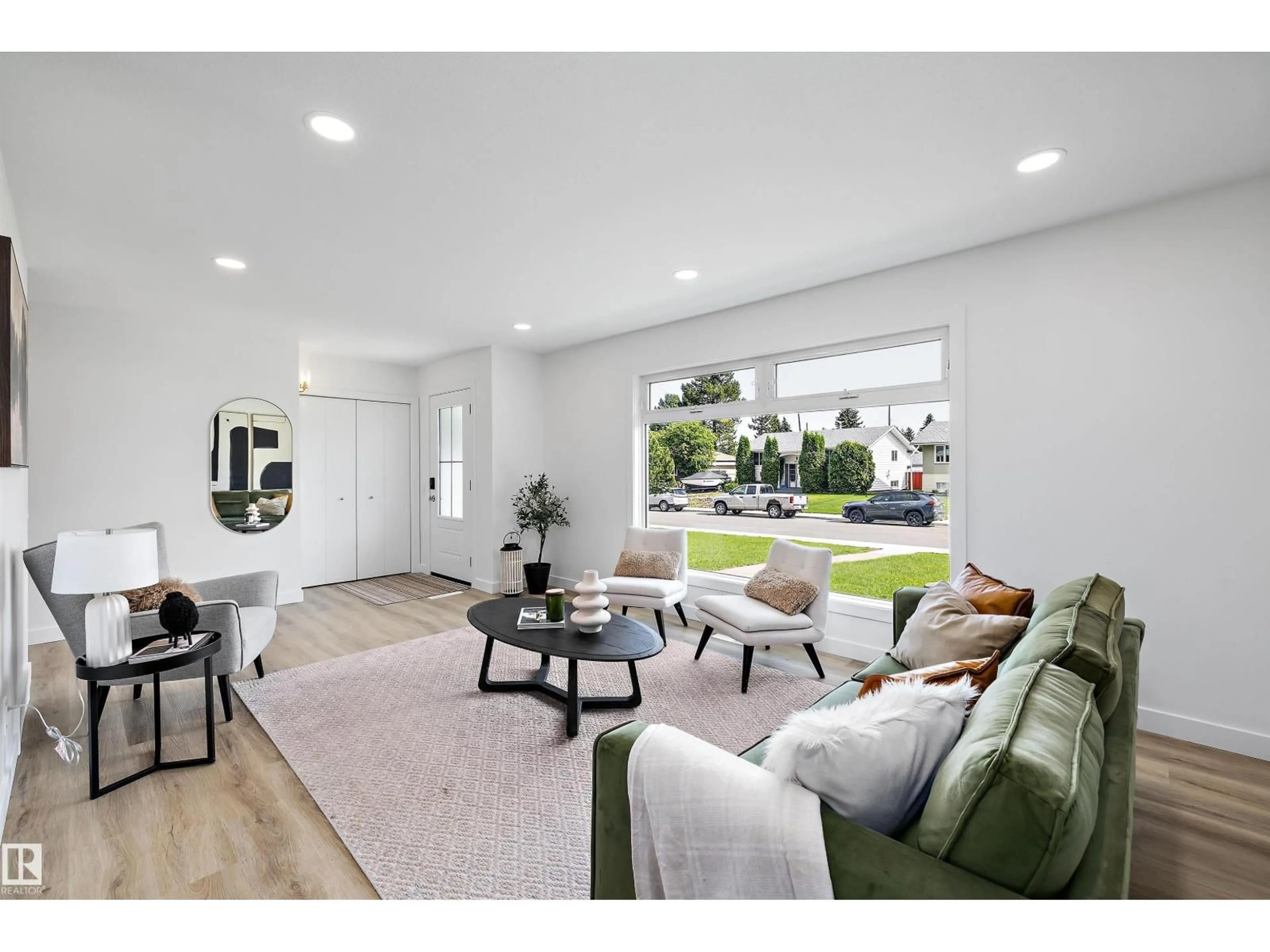 Living room with furniture, unknown for 7004 93 AV, Edmonton Alberta T6B0W6
