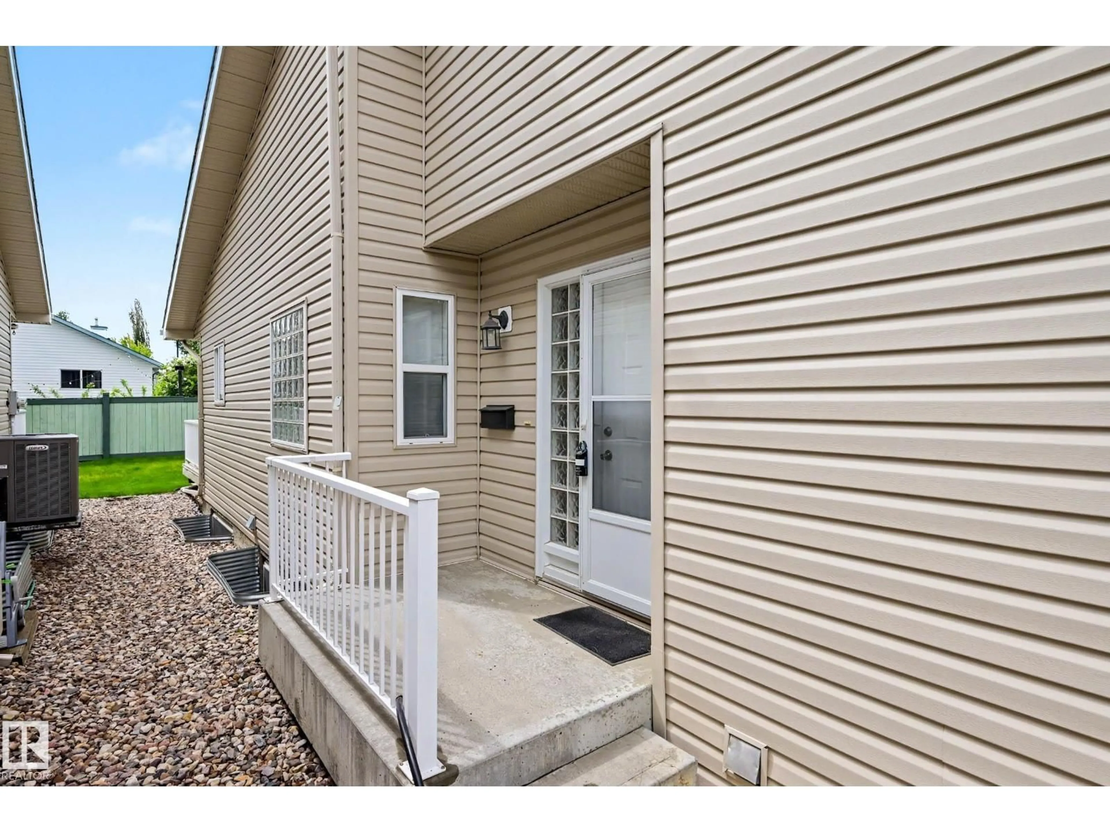 Home with vinyl exterior material, street for 6 - 2031 BRENNAN CR, Edmonton Alberta T5T0W3