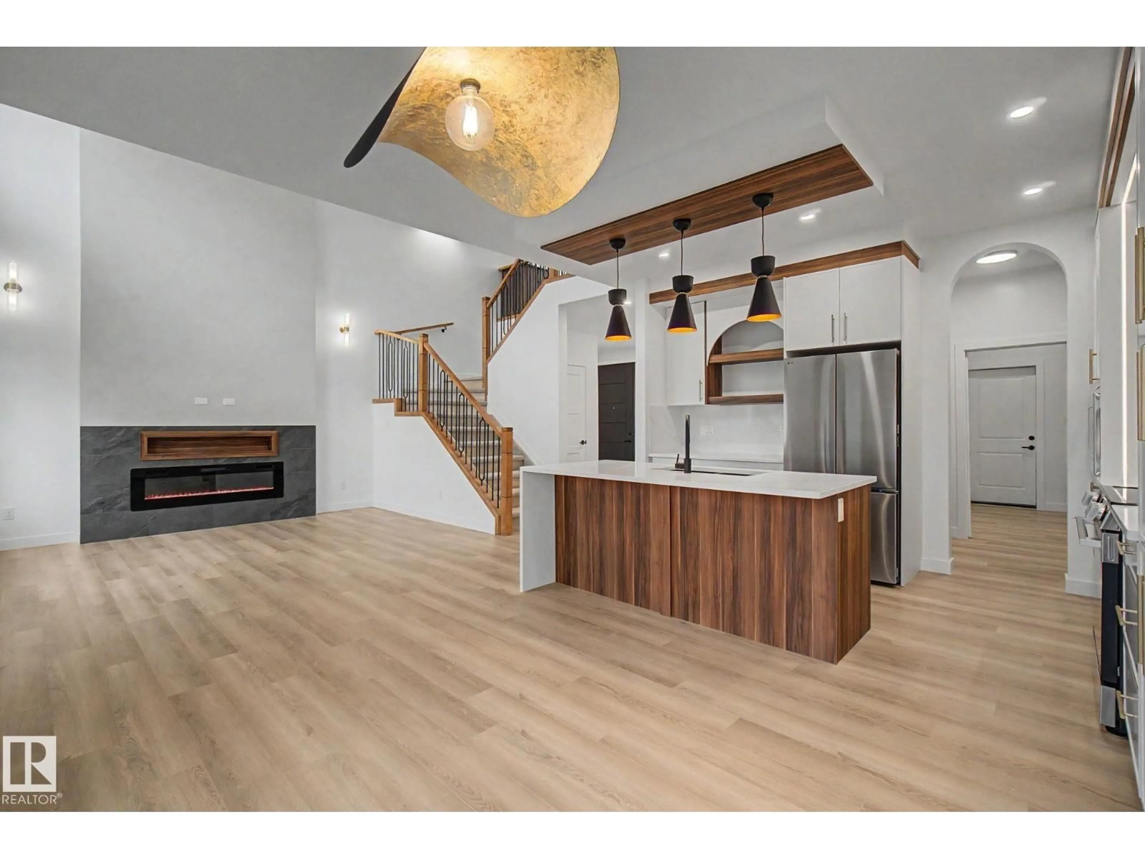 Open concept kitchen, wood/laminate floor for 4 WILLOW HEIGHTS DR, Stony Plain Alberta T7Z2J9