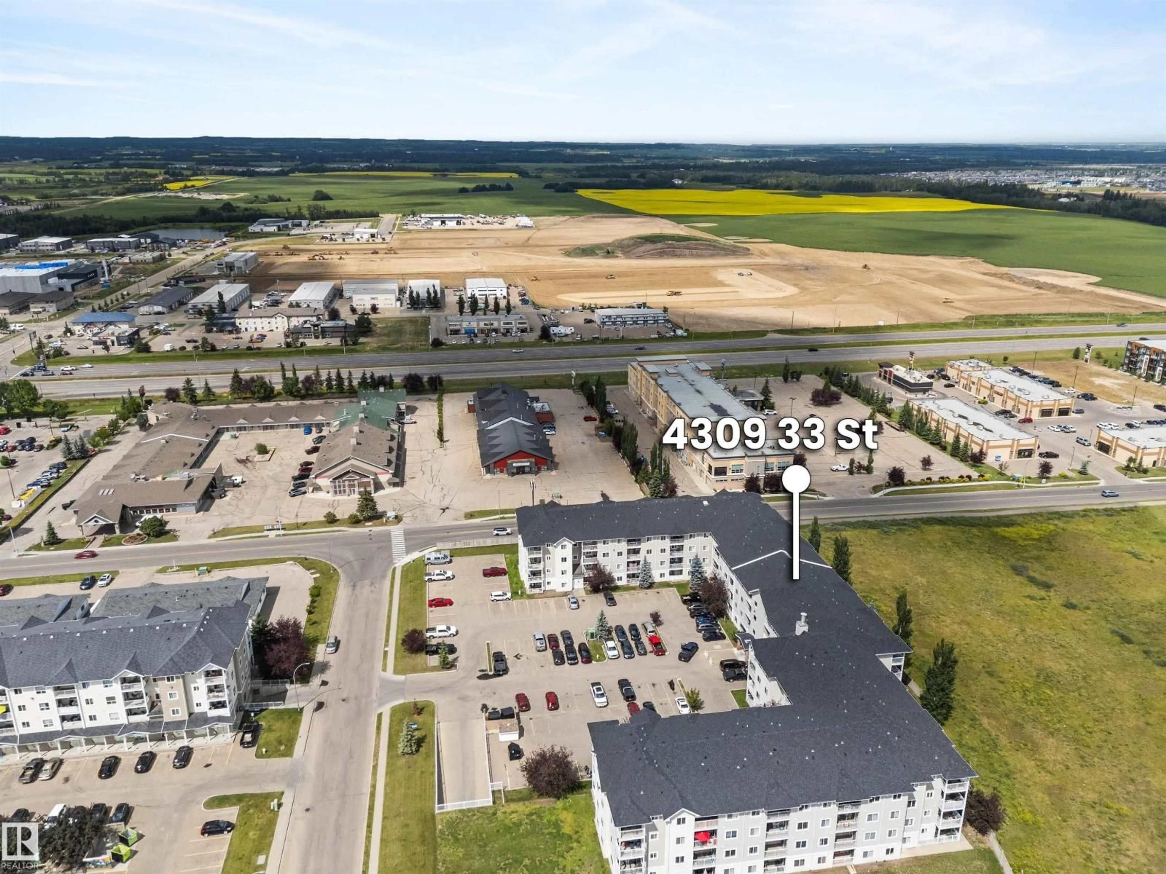 A pic from outside/outdoor area/front of a property/back of a property/a pic from drone, building for 330 4309 33 ST, Stony Plain Alberta T7Z0C4