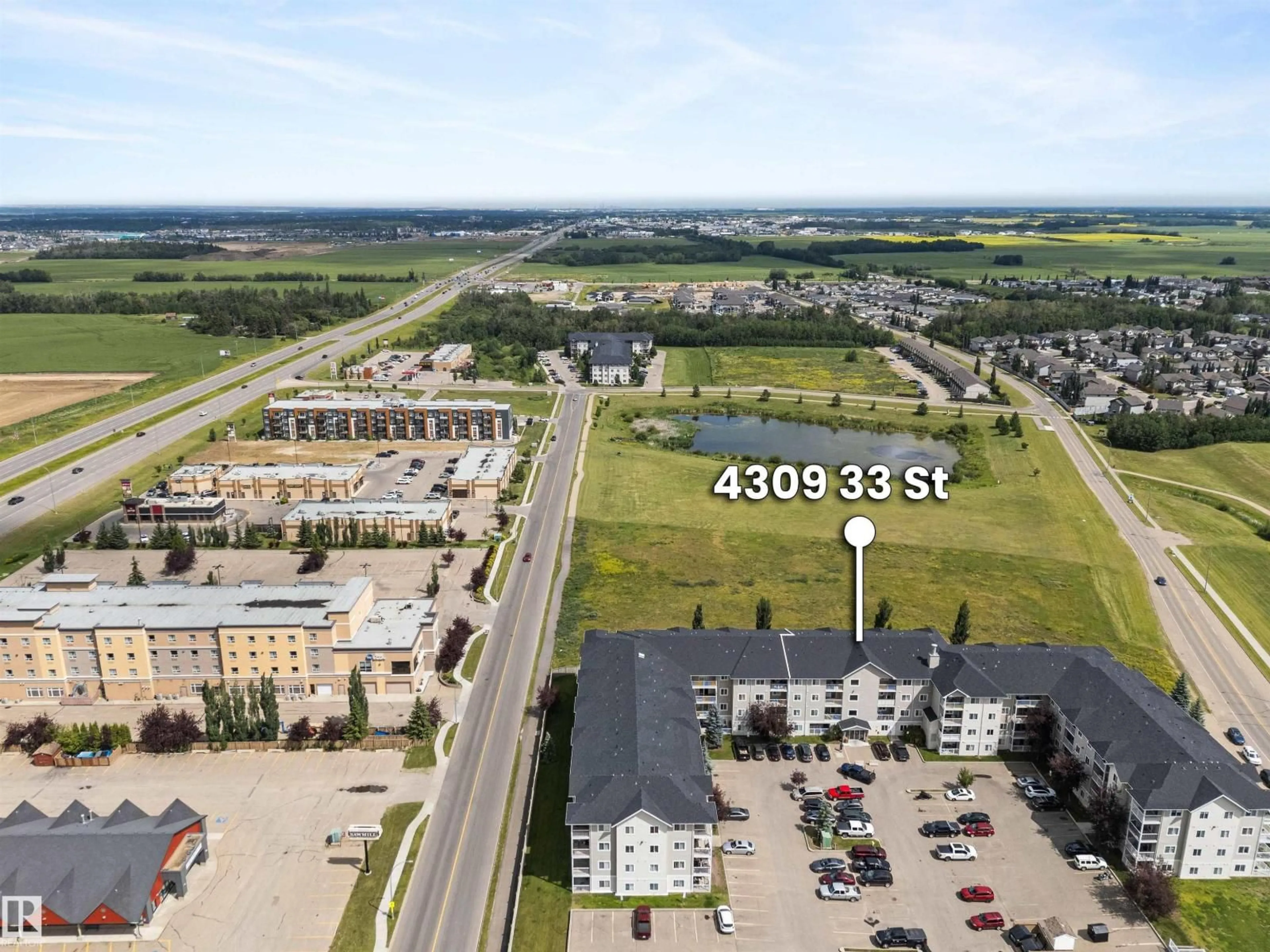A pic from outside/outdoor area/front of a property/back of a property/a pic from drone, street for 330 4309 33 ST, Stony Plain Alberta T7Z0C4