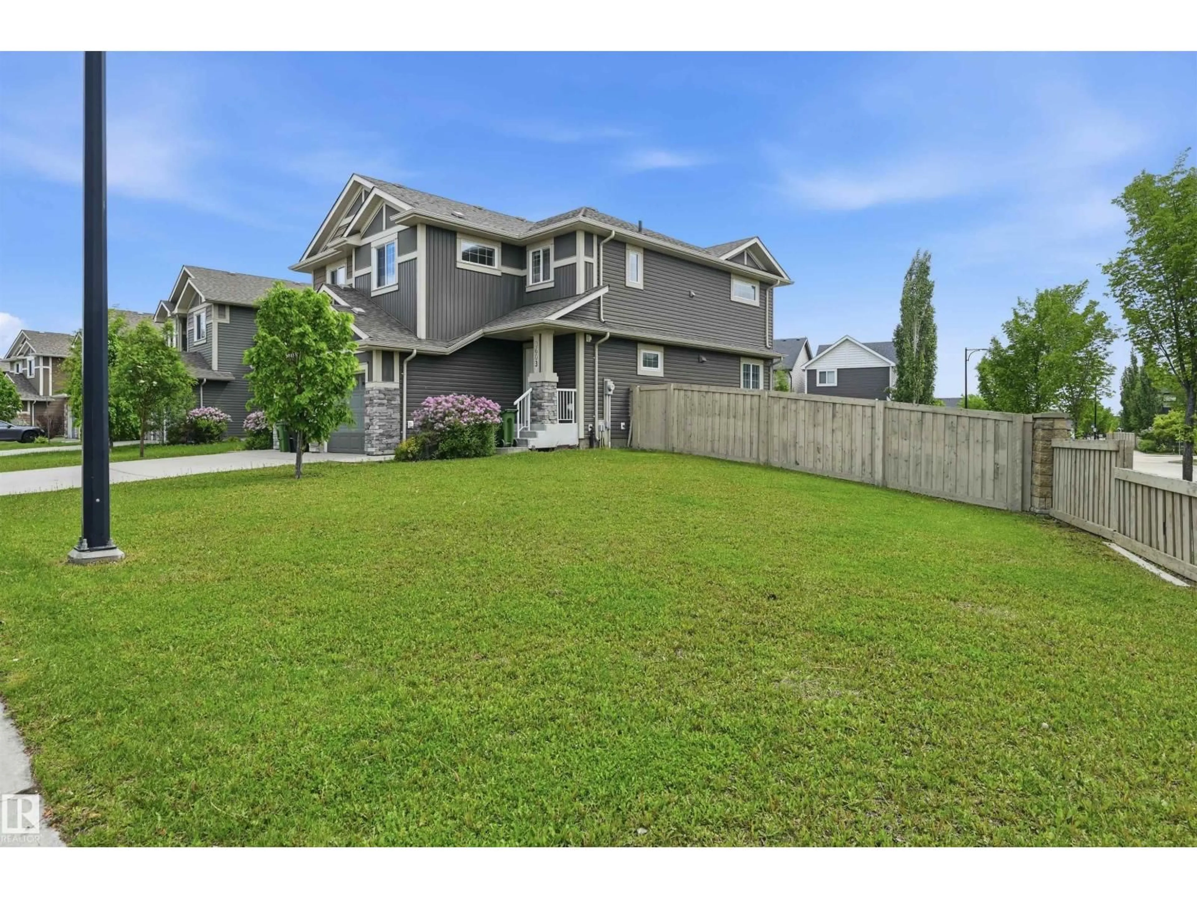 A pic from outside/outdoor area/front of a property/back of a property/a pic from drone, mountain view for 3603 ATKINSON LO, Edmonton Alberta T6W0X3