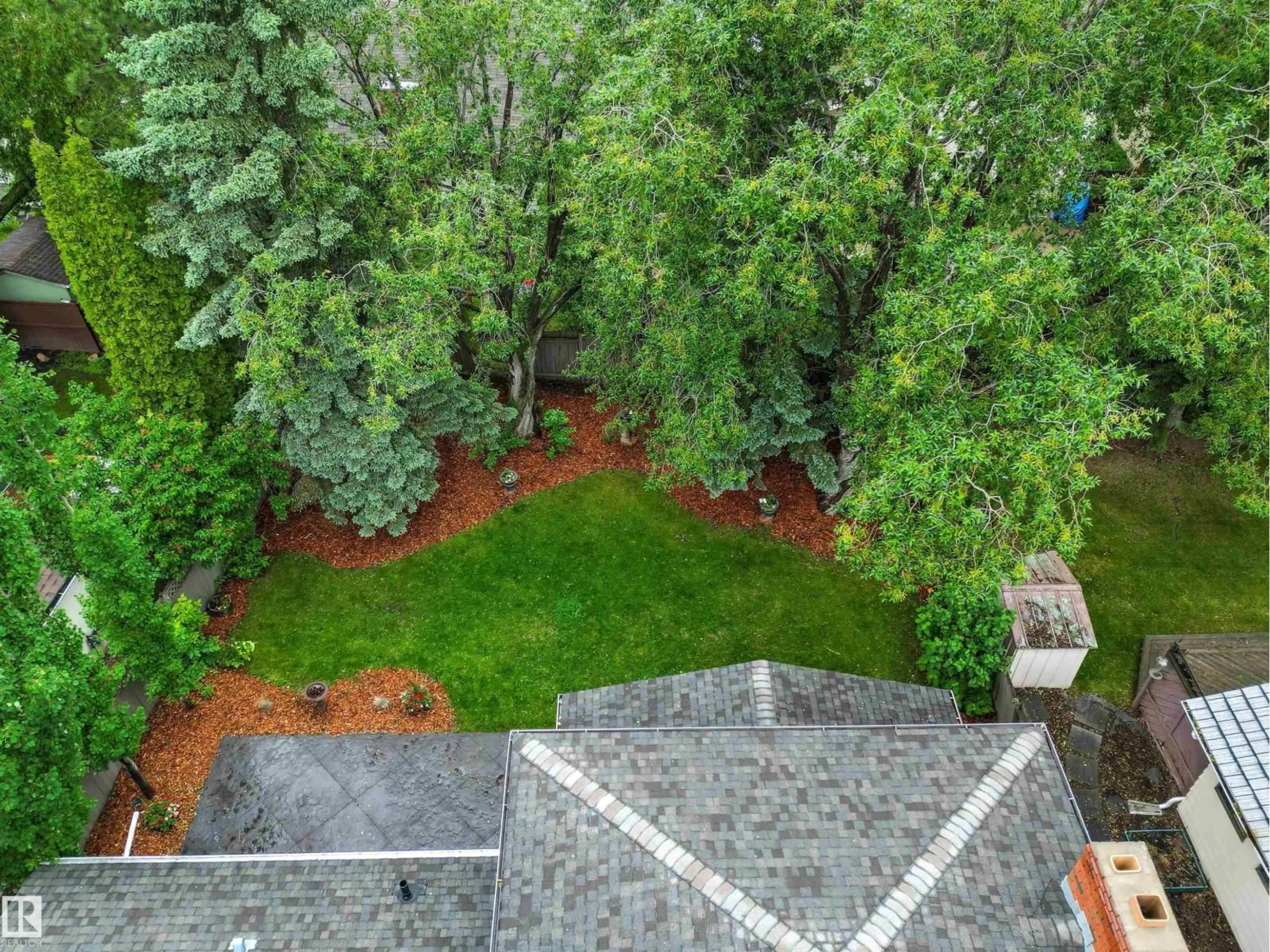 A pic from outside/outdoor area/front of a property/back of a property/a pic from drone, forest/trees view for 155 GARIEPY CR, Edmonton Alberta T6M1B5