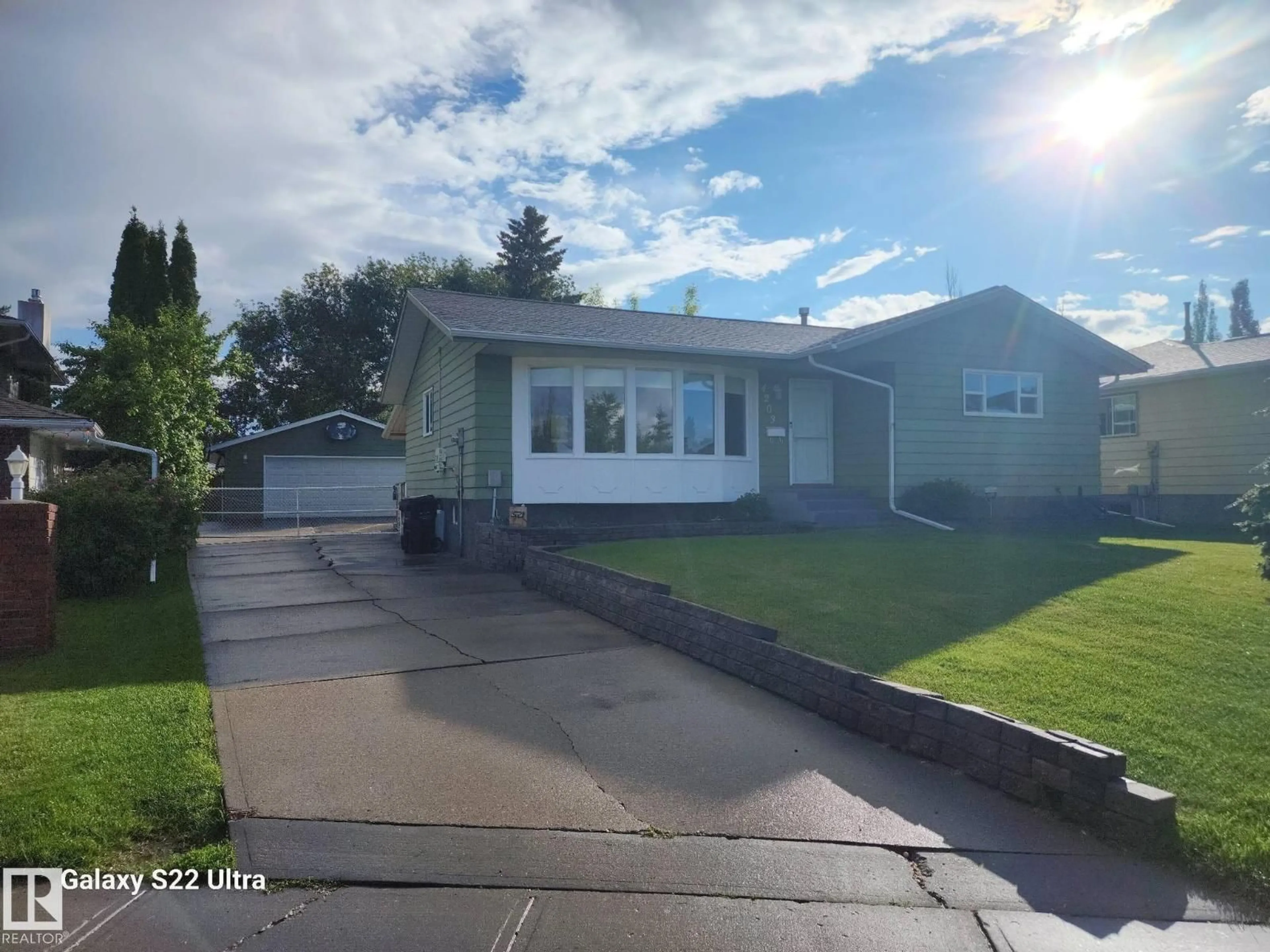 Home with vinyl exterior material, street for 4203 42 AV, Leduc Alberta T9E4S2