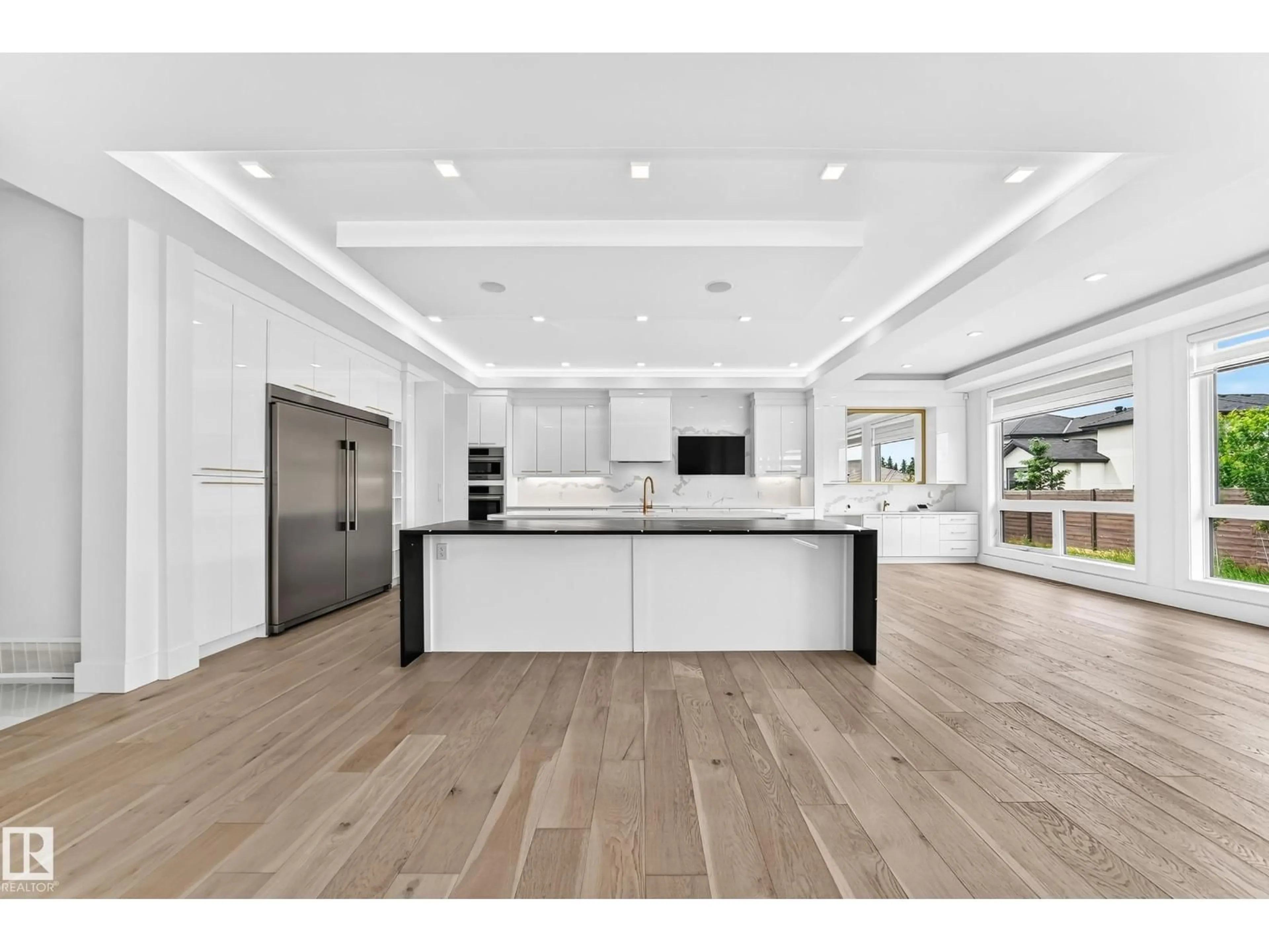 Open concept kitchen, wood/laminate floor for 2747 WHEATON DR, Edmonton Alberta T6W2M5