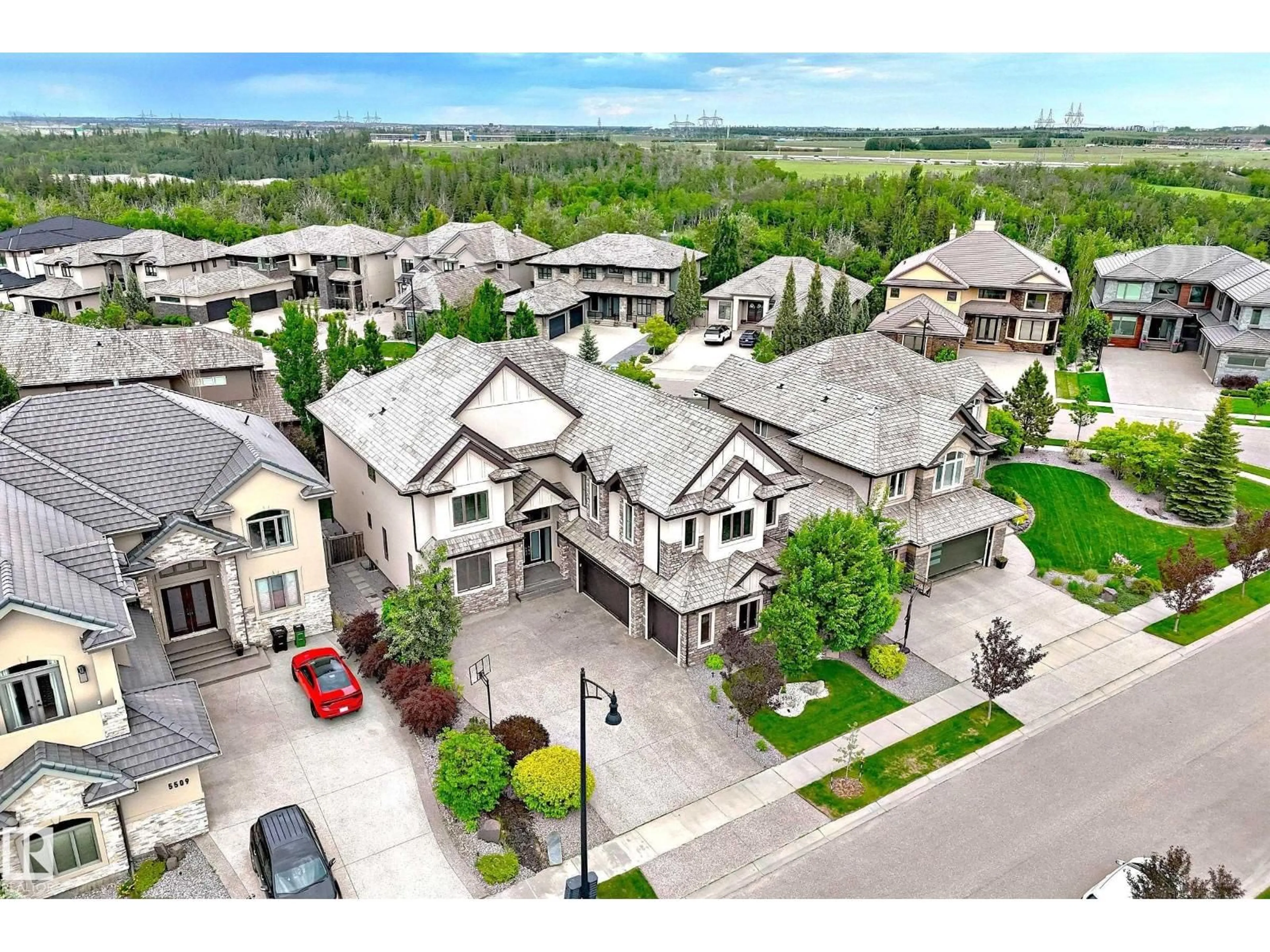 A pic from outside/outdoor area/front of a property/back of a property/a pic from drone, street for 5511 MCLUHAN BLUFF BL, Edmonton Alberta T6R0J4