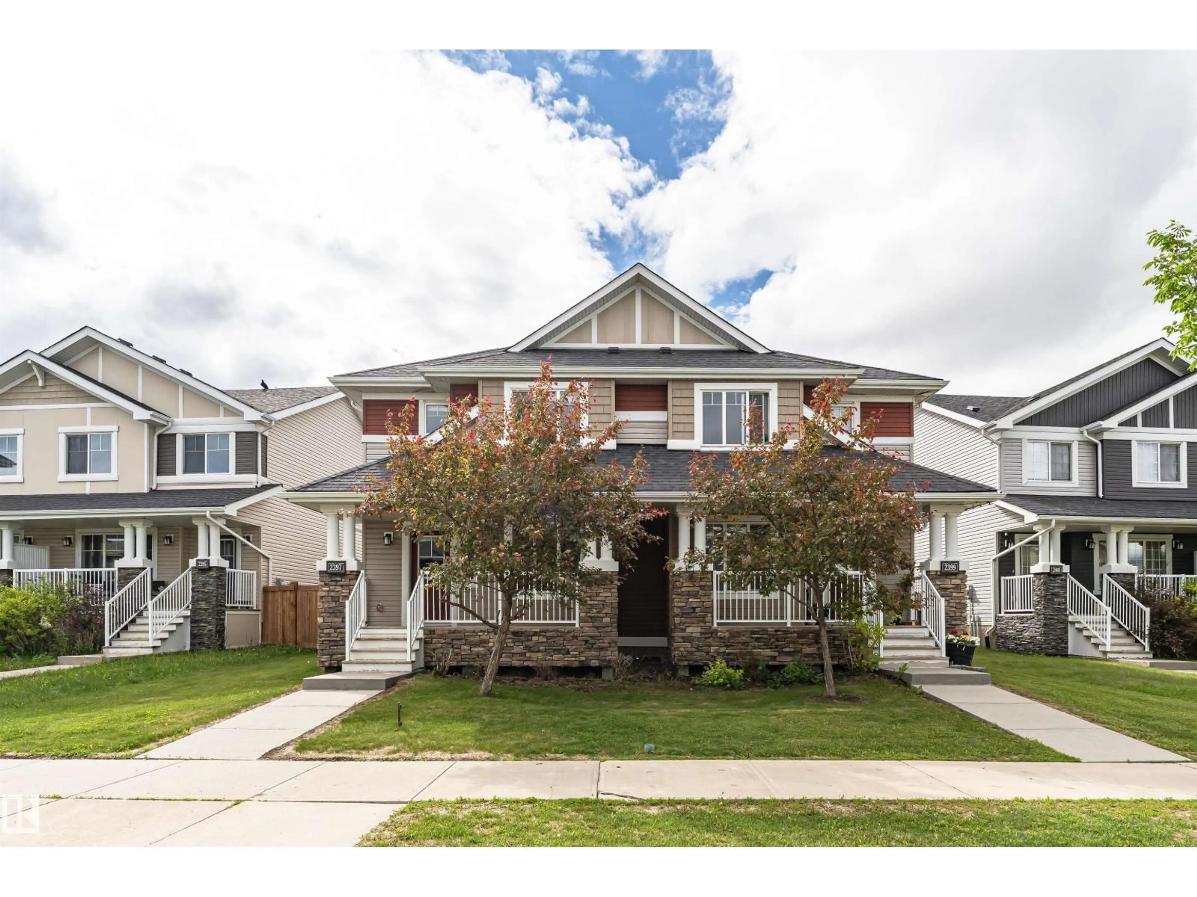 Home with vinyl exterior material, street for 2397 GLENRIDDING BV, Edmonton Alberta T6W2W7