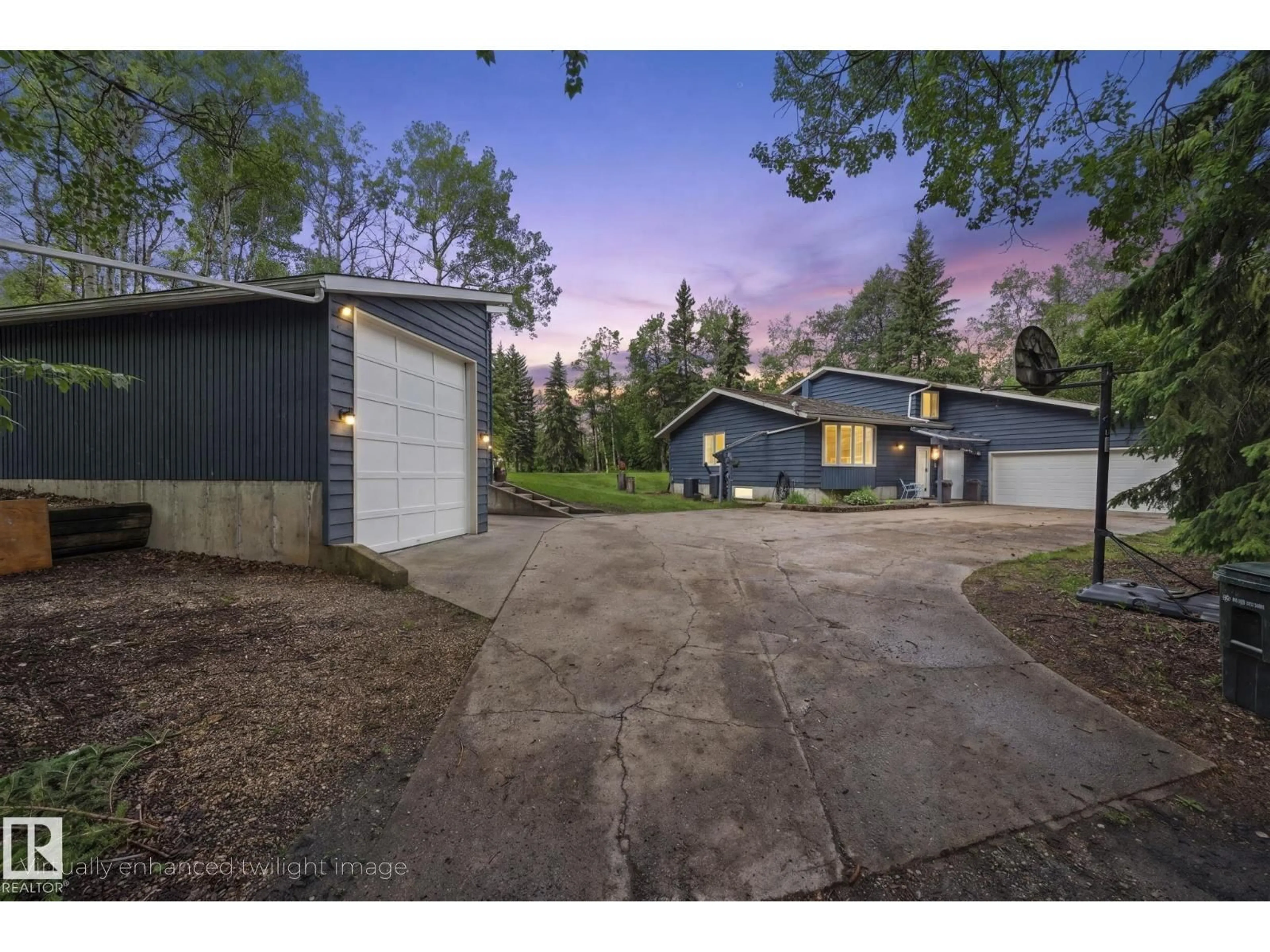 A pic from outside/outdoor area/front of a property/back of a property/a pic from drone, street for 265 TWP ROAD 530, Rural Strathcona County Alberta T8E2C5