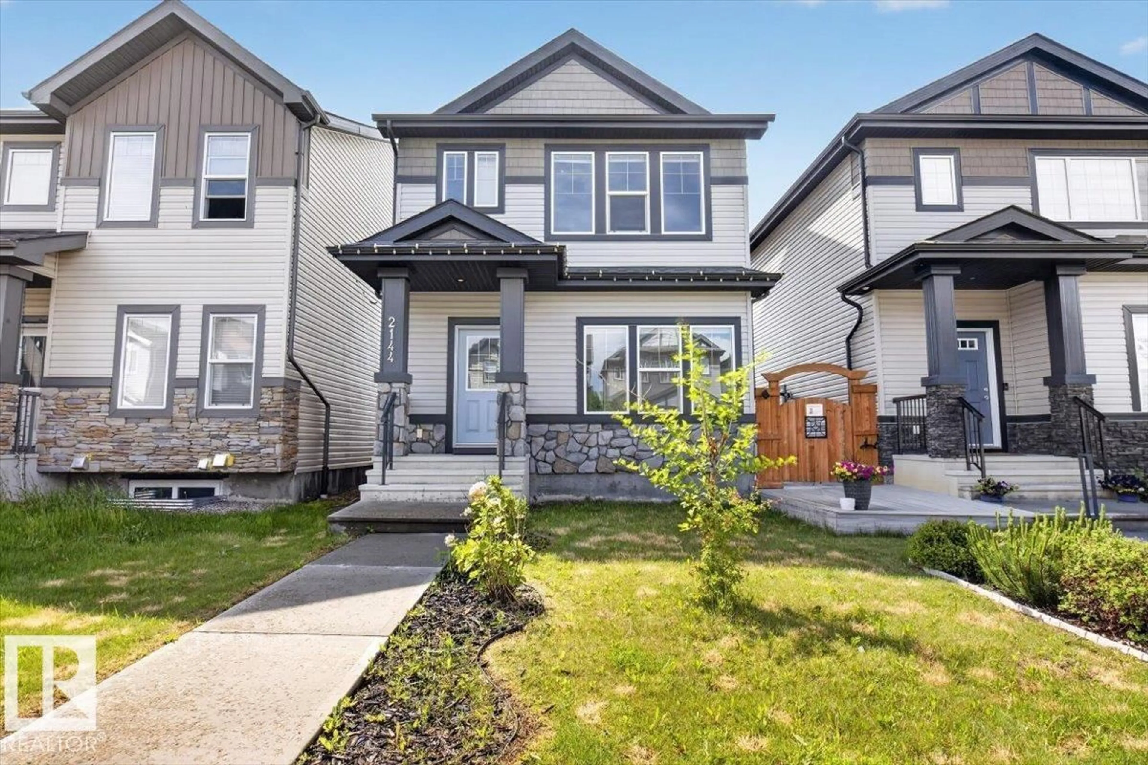 Home with vinyl exterior material, street for 2144 51 ST, Edmonton Alberta T6X2W1