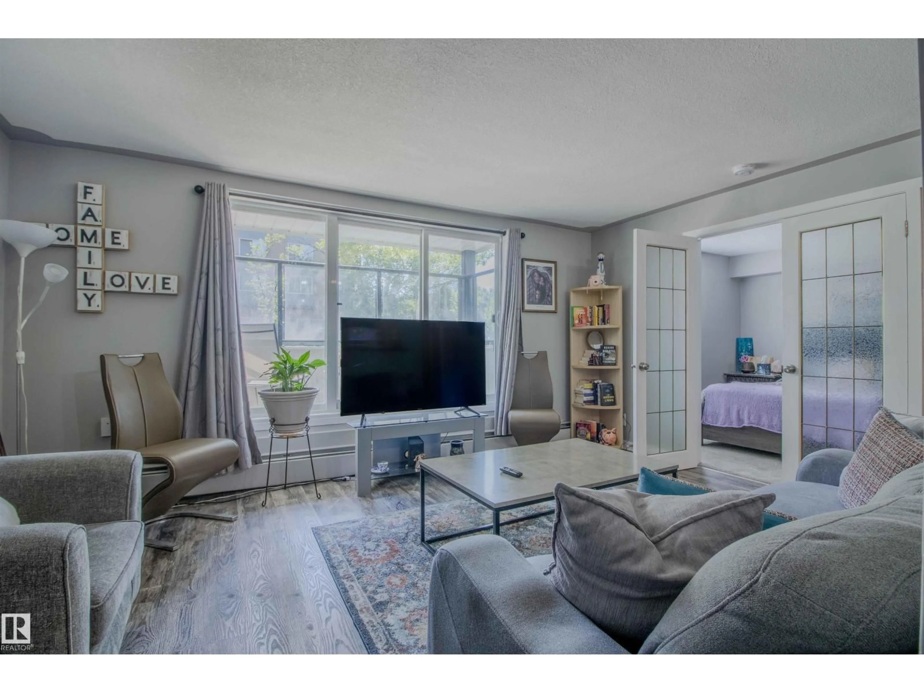 Living room with furniture, unknown for 11010 - 27 124 ST, Edmonton Alberta T5M0J3