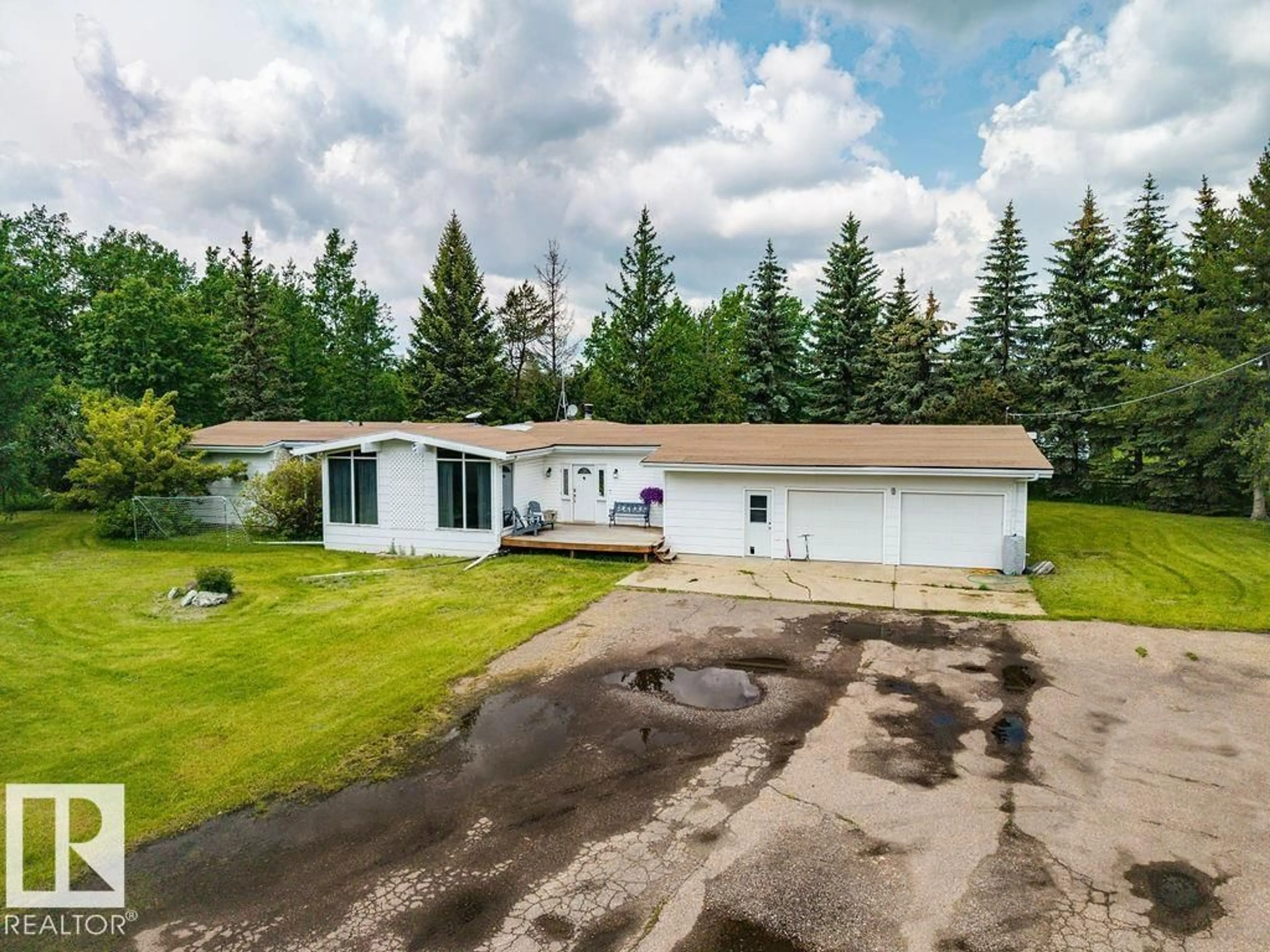 A pic from outside/outdoor area/front of a property/back of a property/a pic from drone, unknown for 21530 WYE RD, Rural Strathcona County Alberta T8E2J2